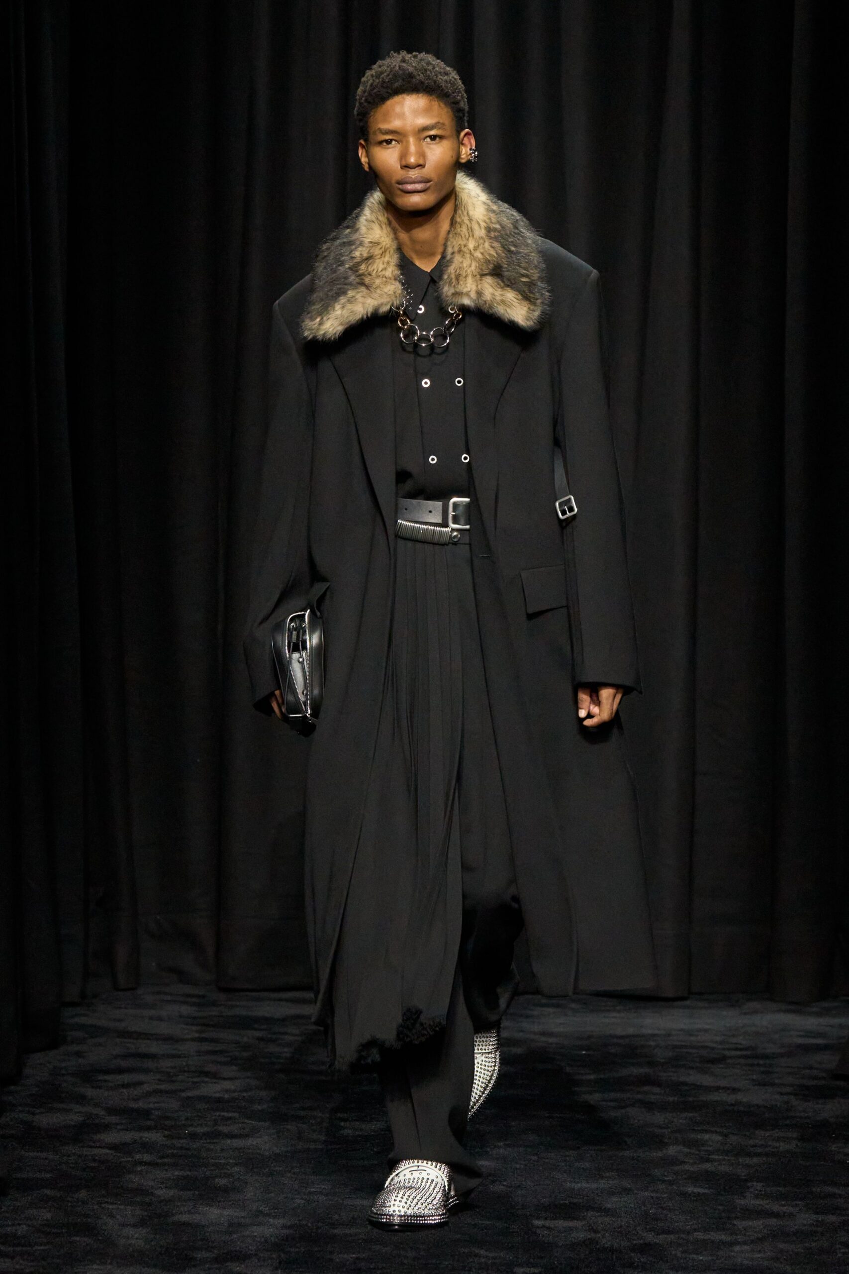 black wool coat with pleated pants