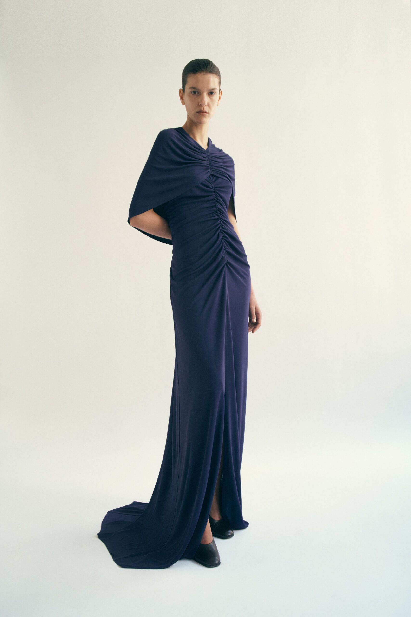 purple silk sleeveless high-neck fitted ruched flowing gown