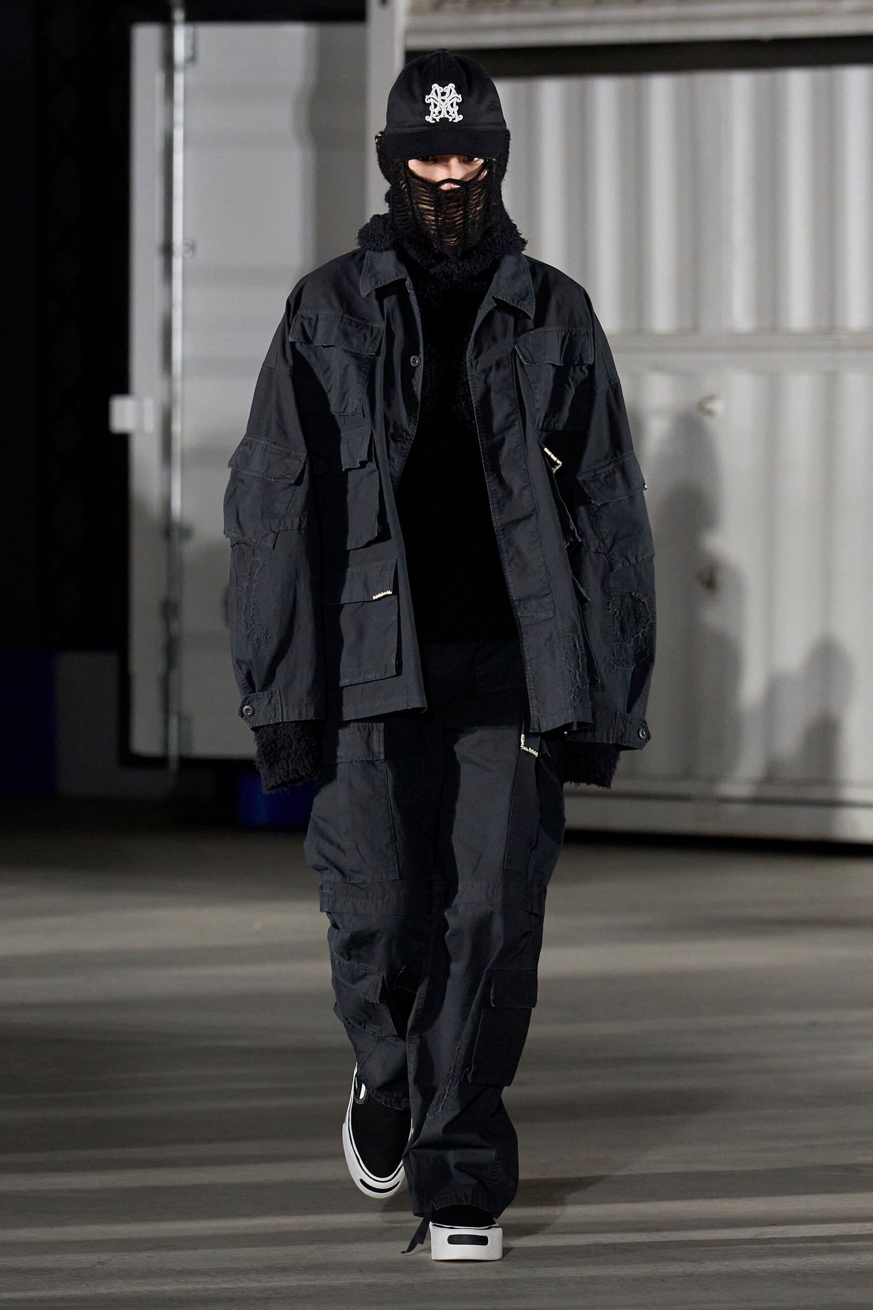 black relaxed jacket and pants outfit