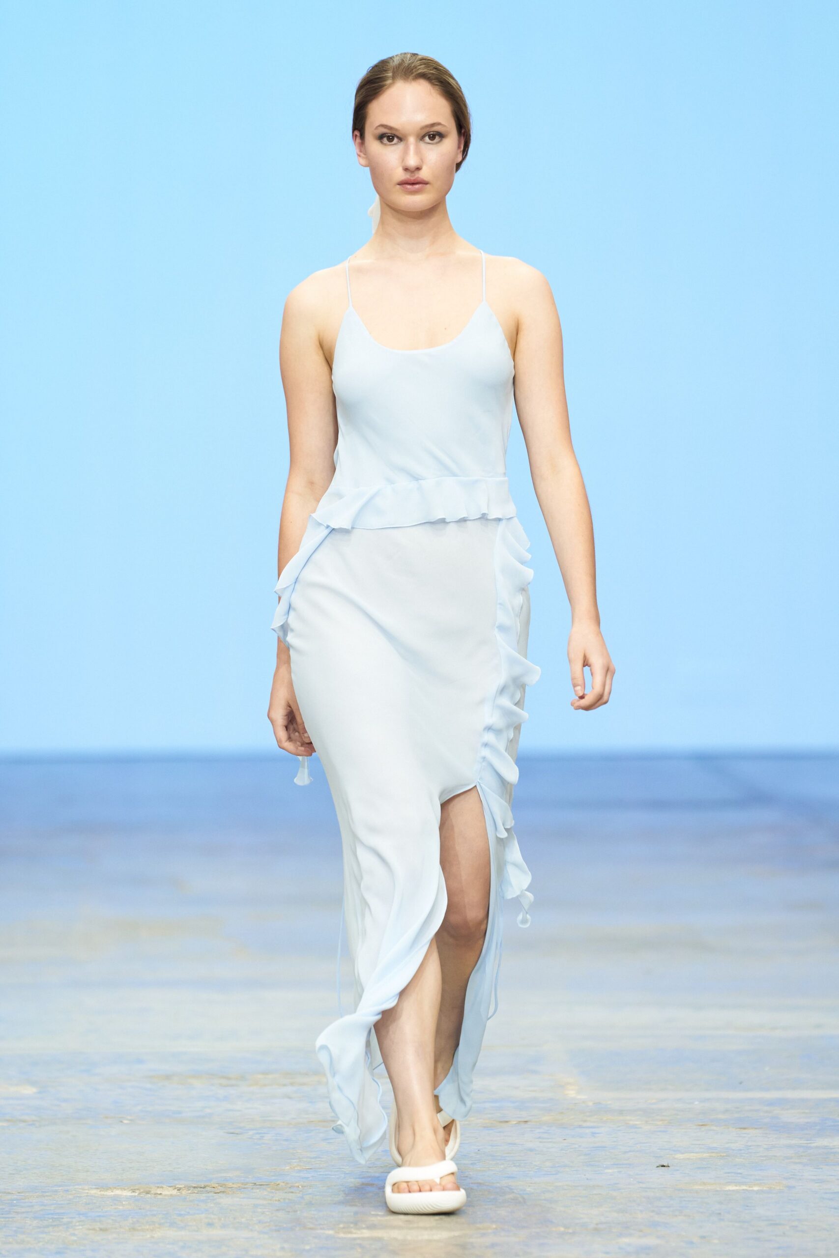 blue silk sleeveless v-neck fitted ruffled flowing dress
