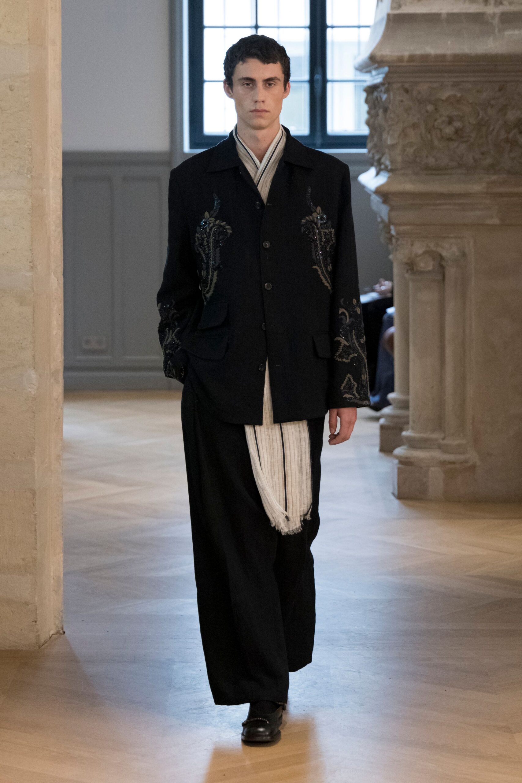 black embroidered jacket with shirt and pants