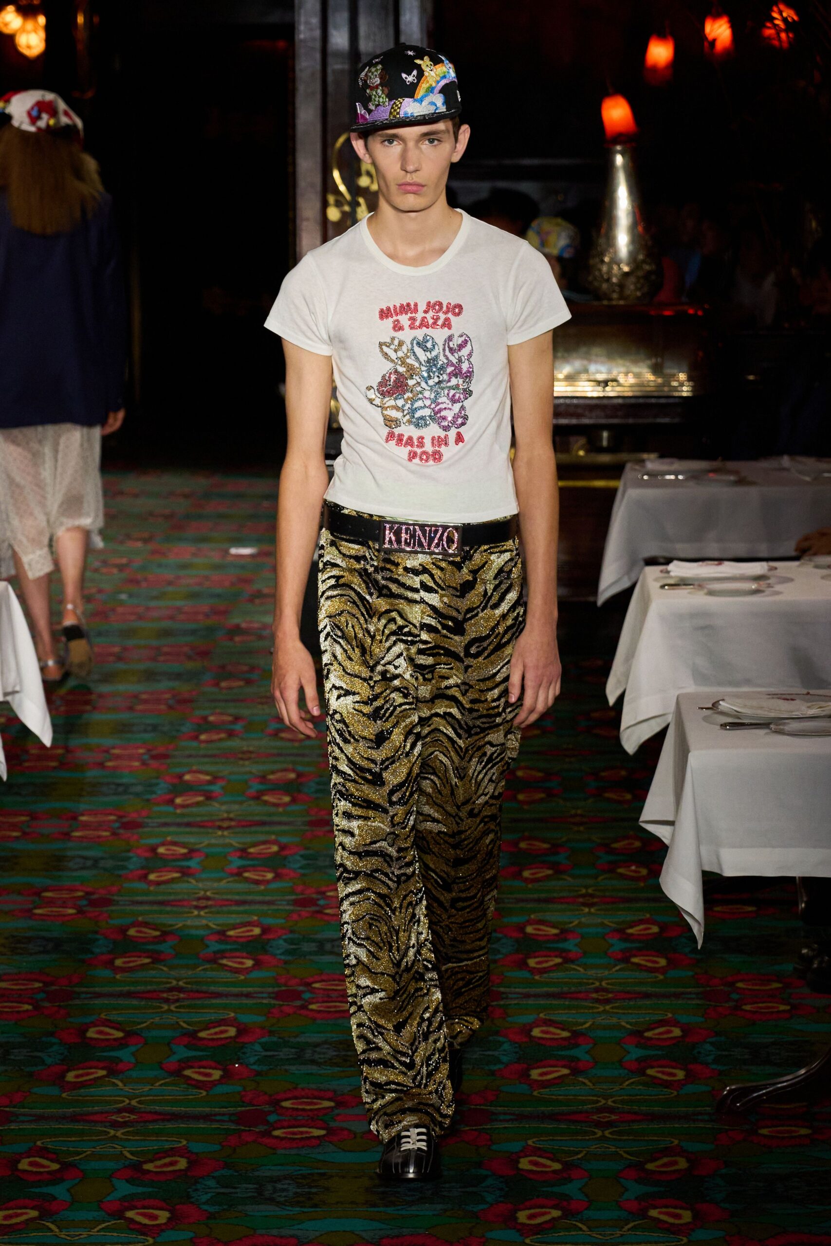 white printed t-shirt with yellow flared pants