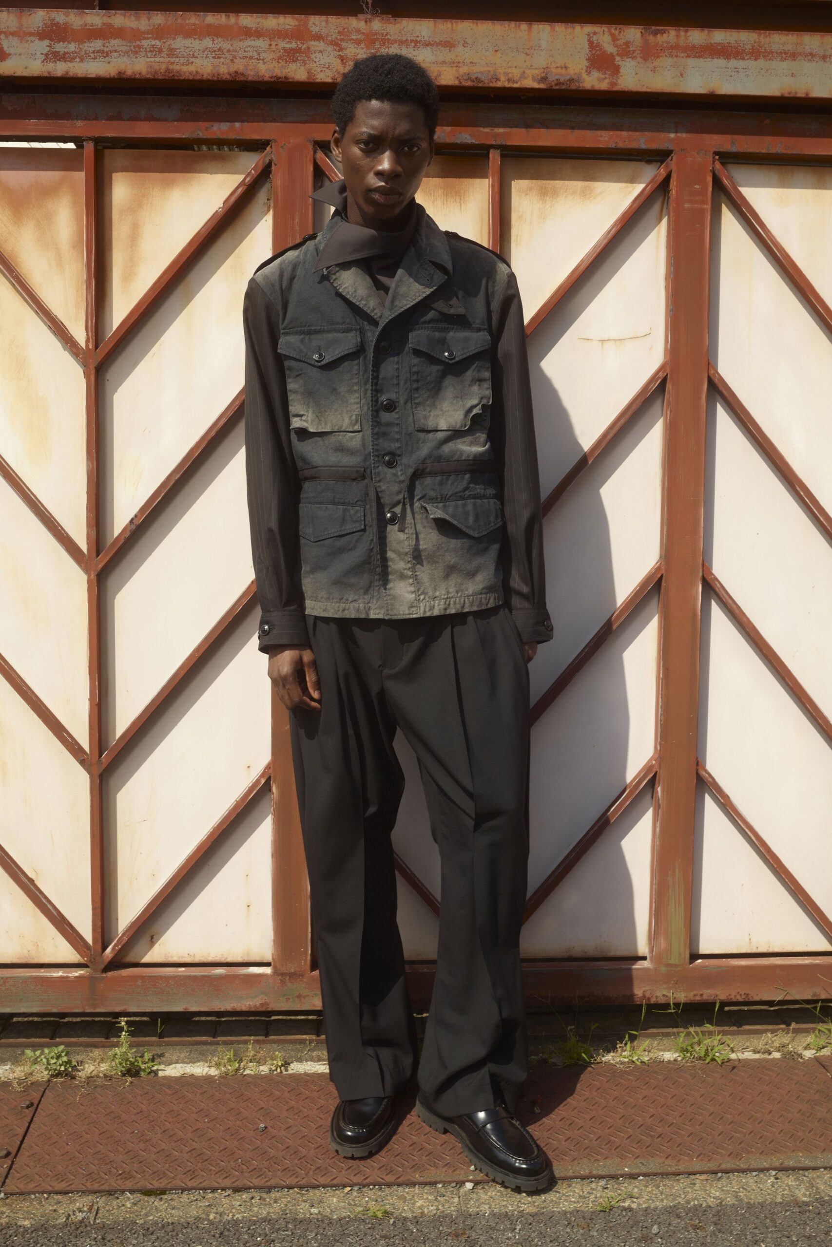 black cotton long-sleeve collared relaxed buttoned pockets vest