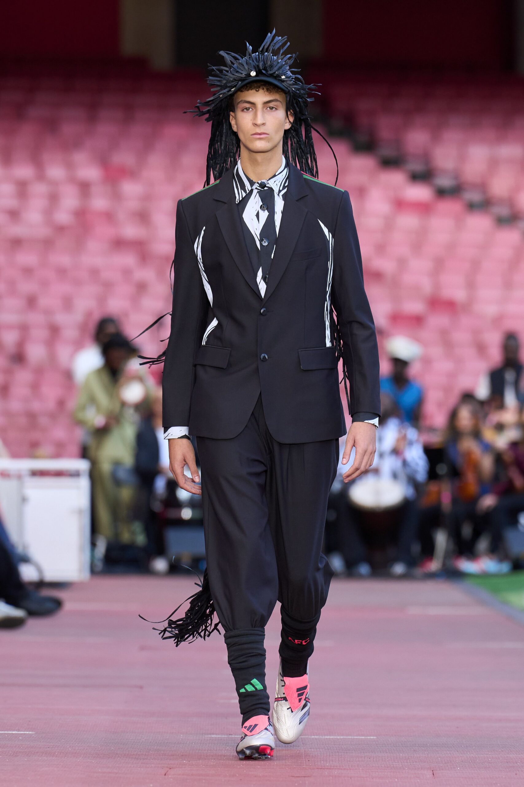 black tailored suit with relaxed pants