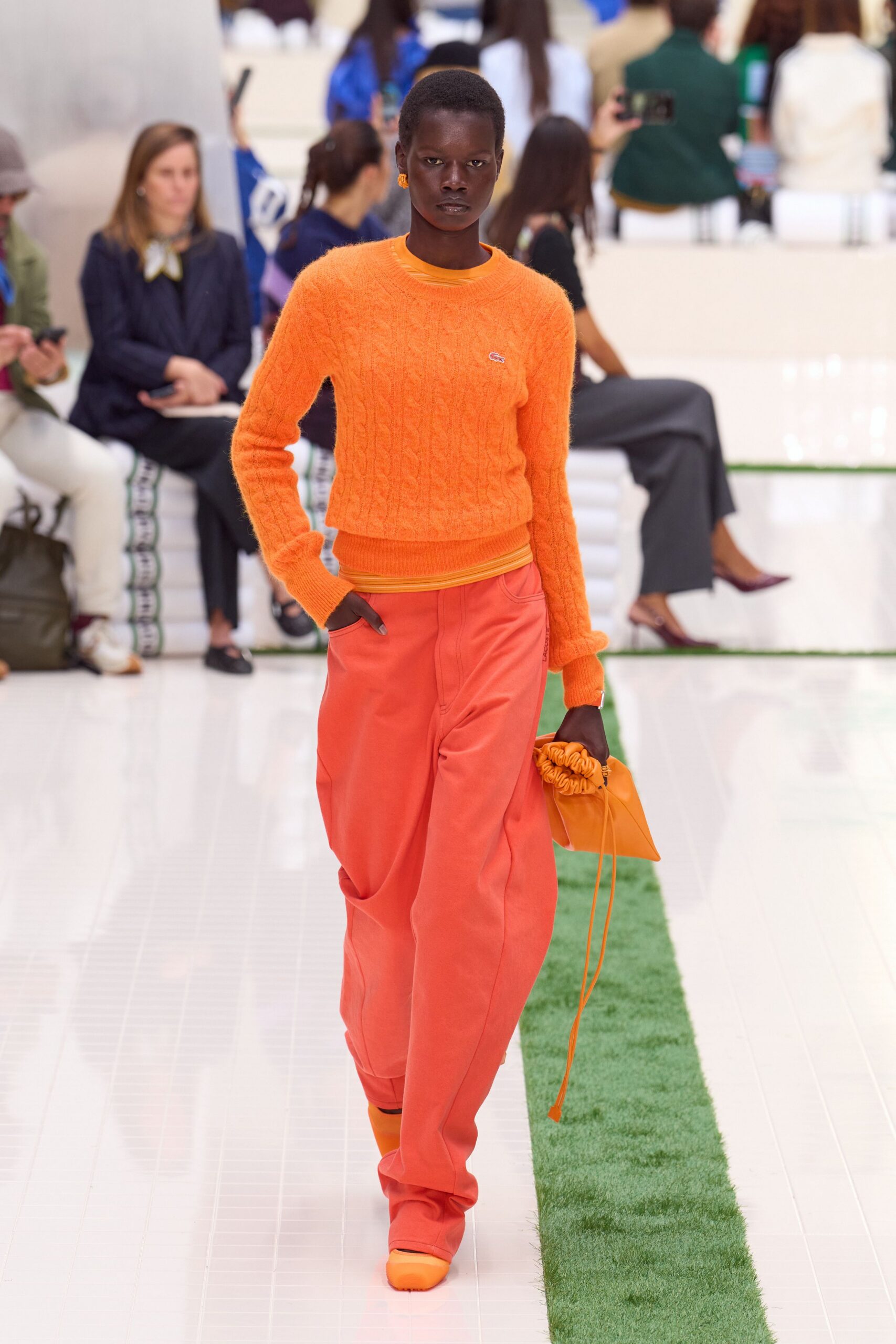 orange sweater and pants ensemble