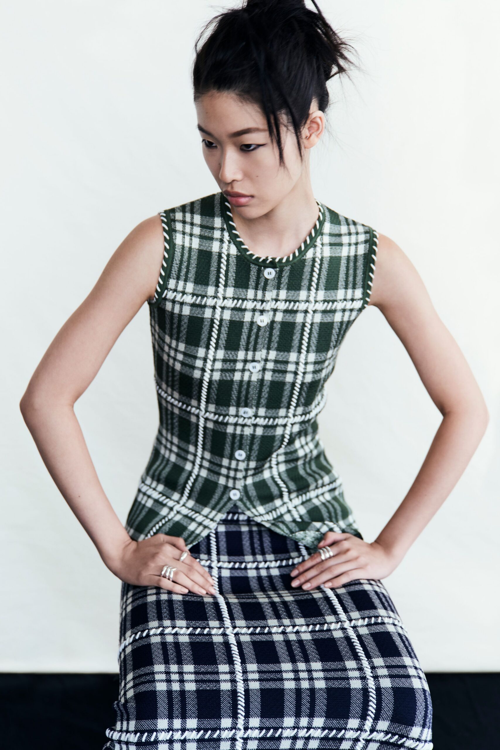 green and navy checked top and skirt