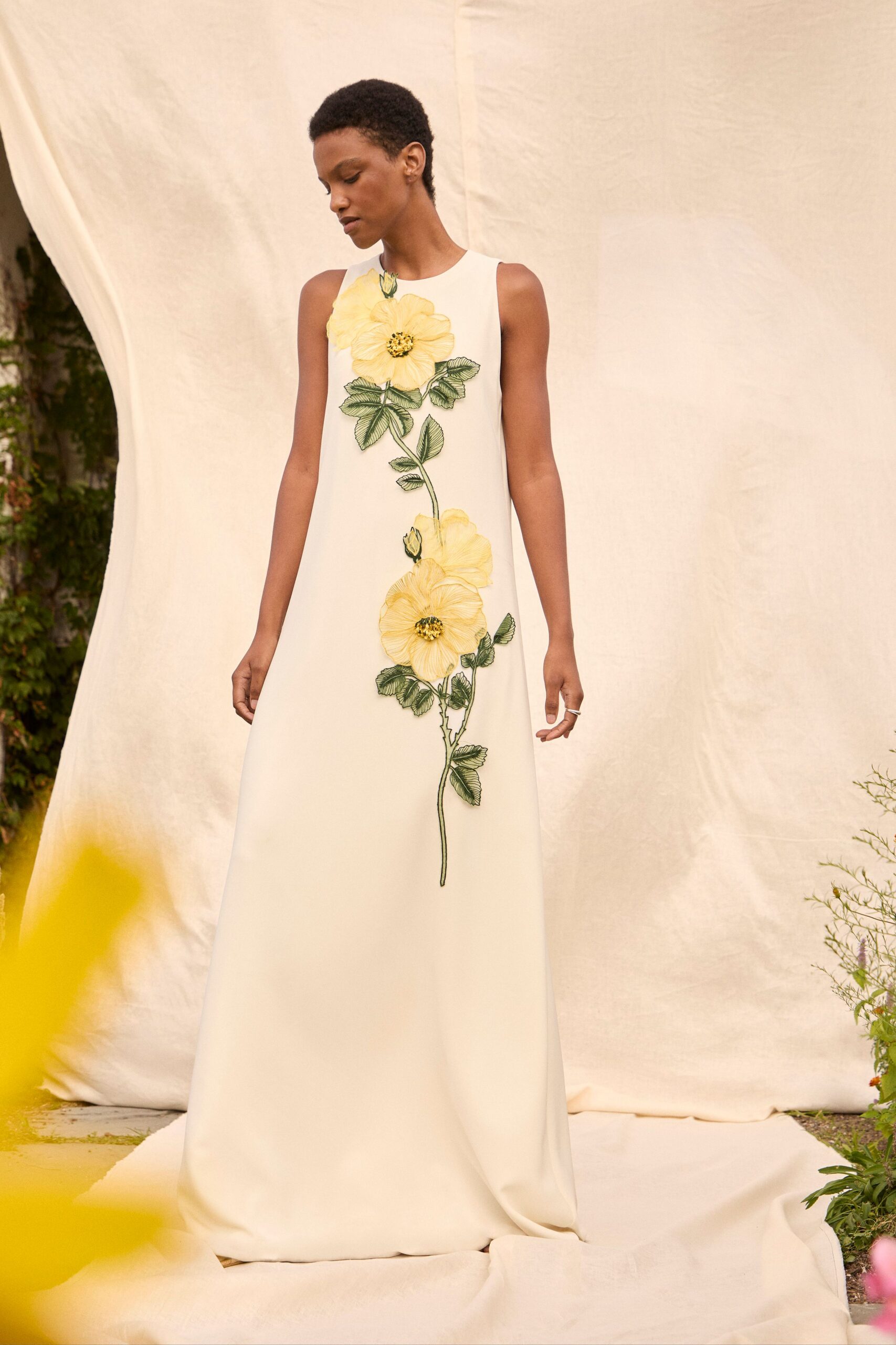 white silk embroidered gown