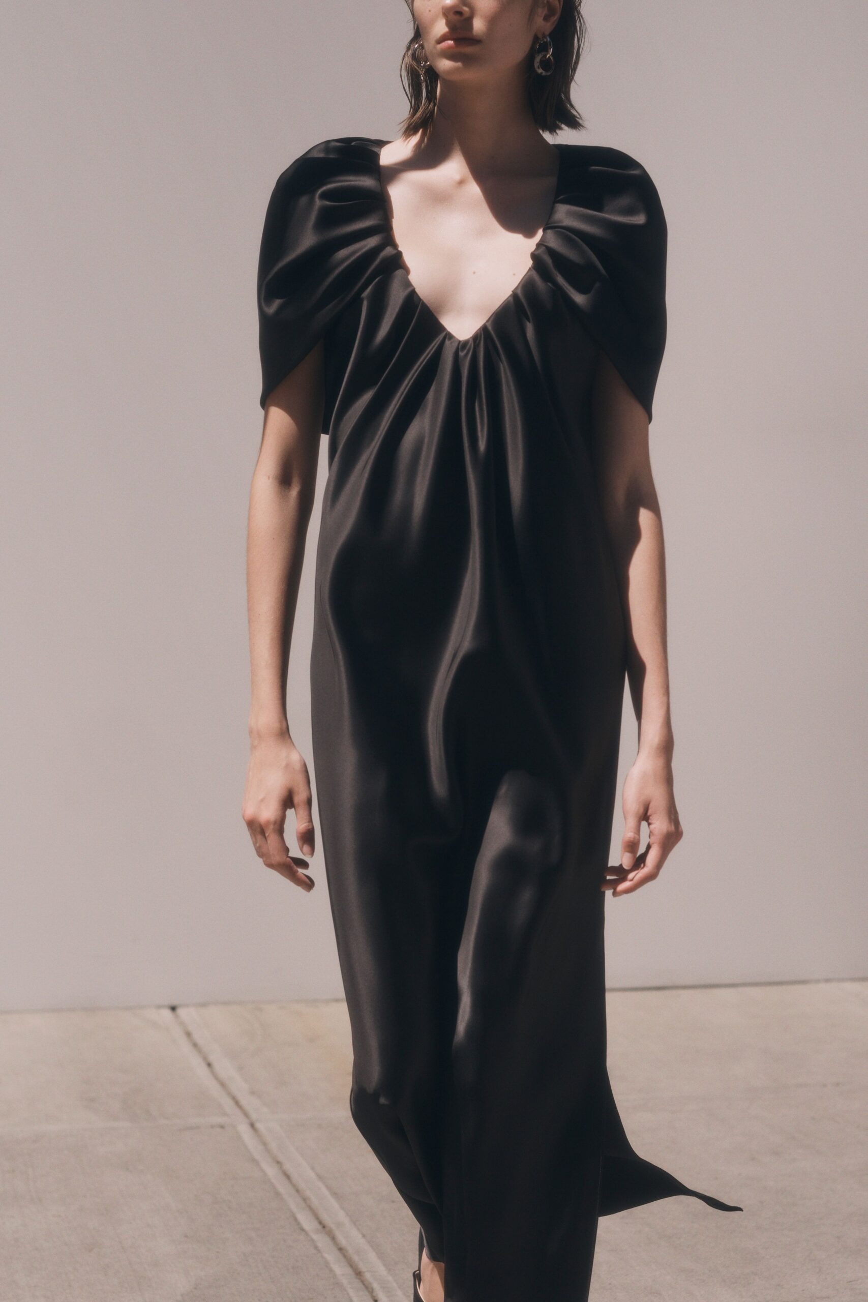 black silk sleeveless gown