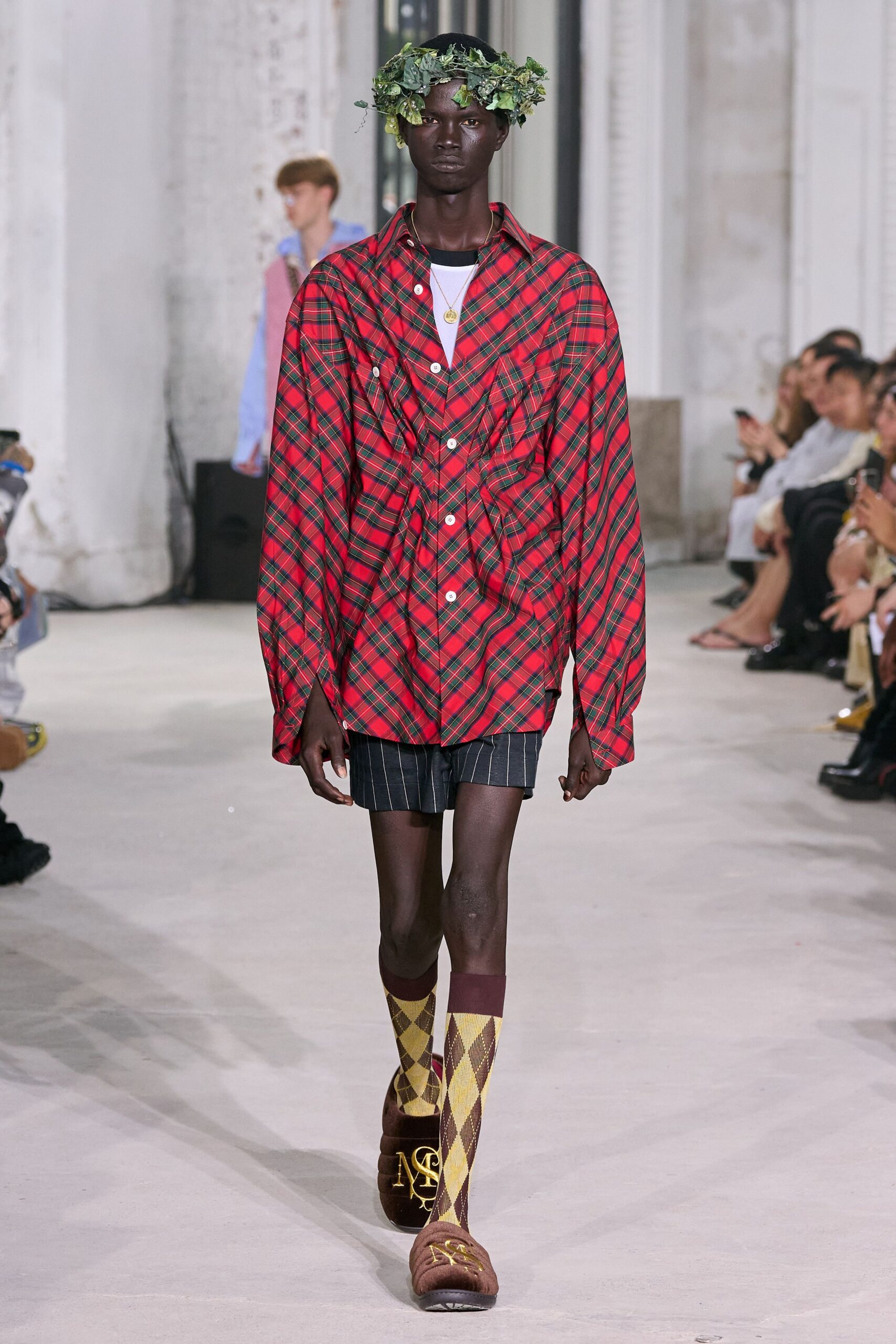 red checked shirt with black shorts