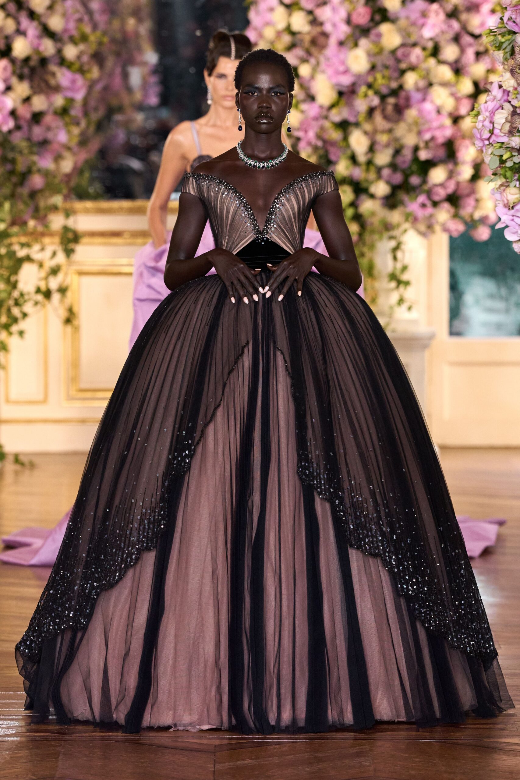 black and purple pleated gown