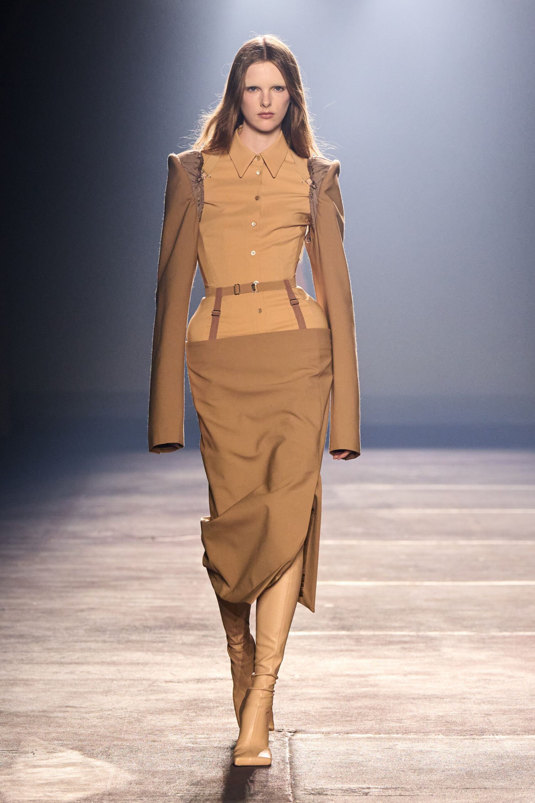 beige fitted midi dress with boots