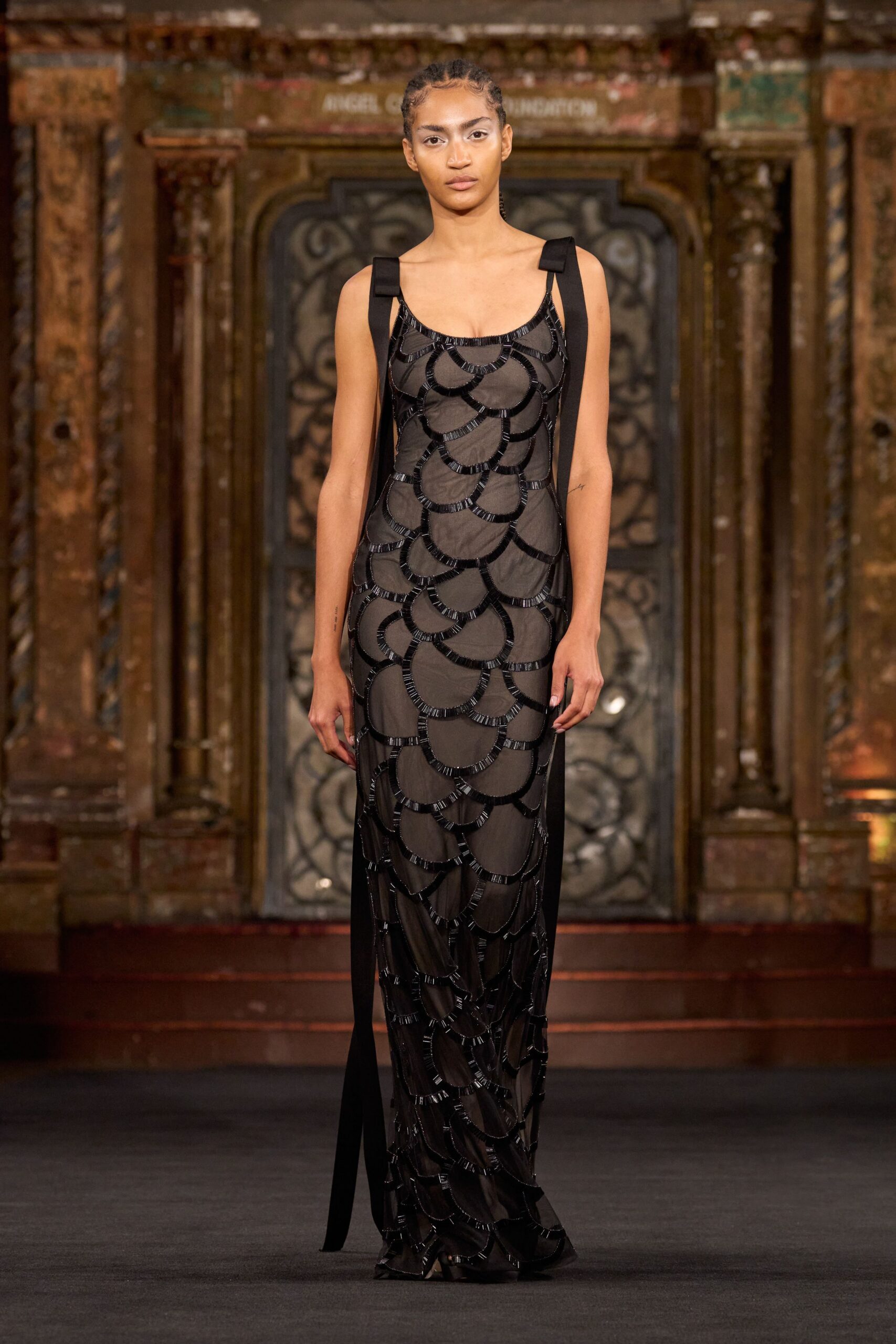 black silk sleeveless gown