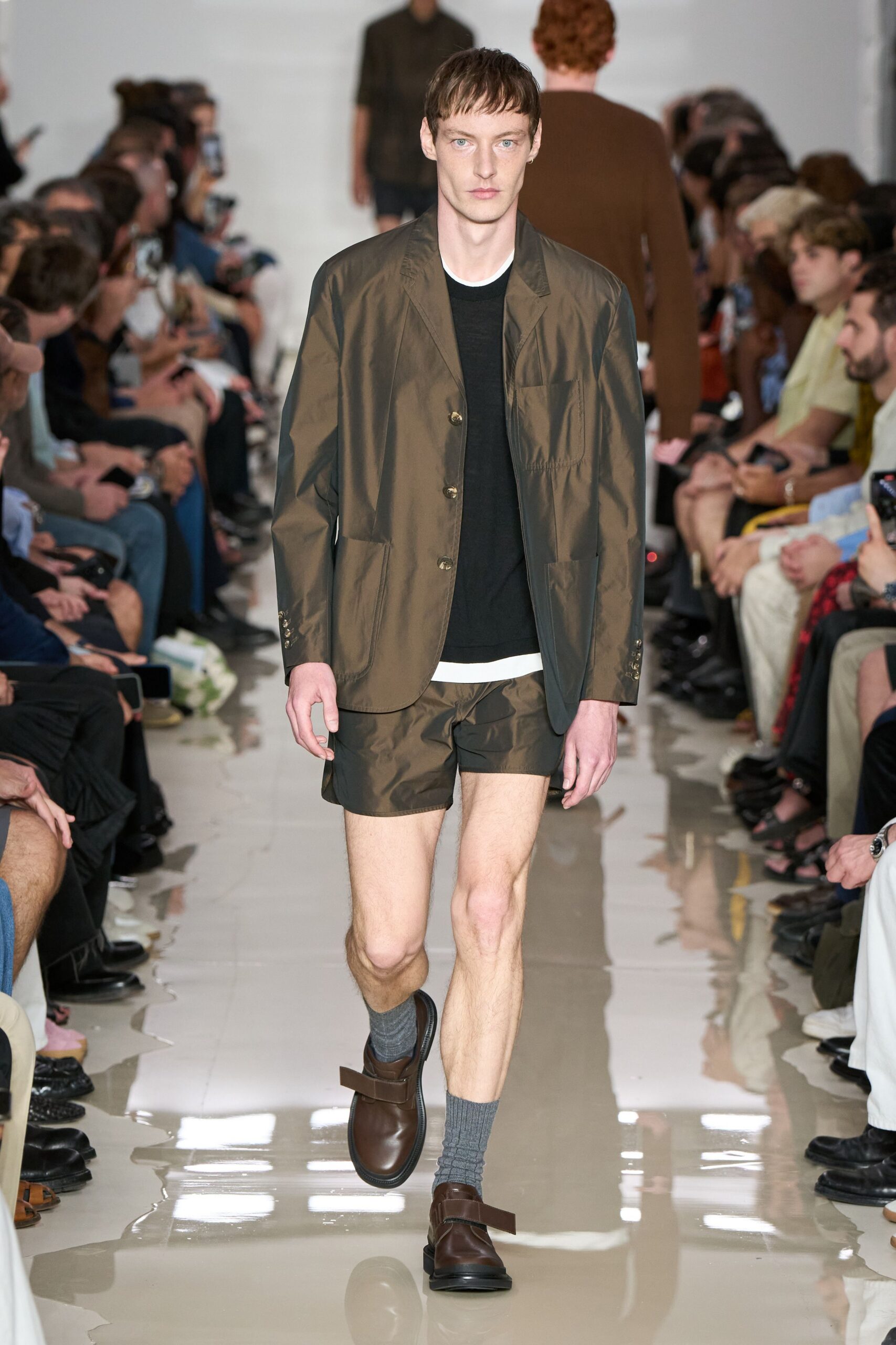 brown blazer black t-shirt camouflage shorts