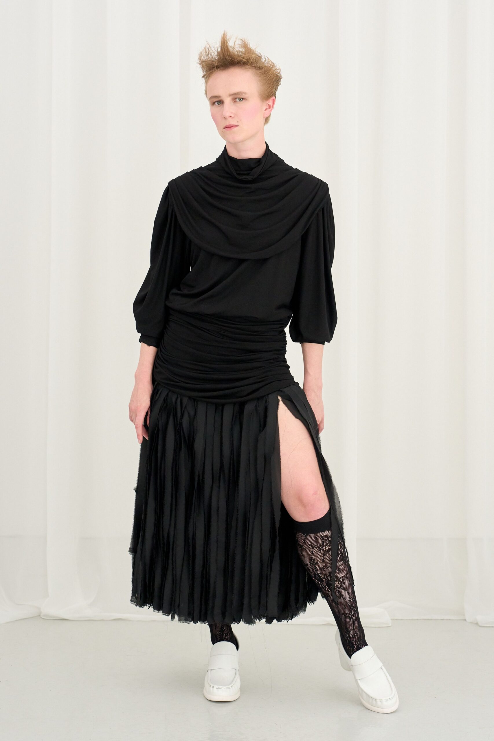 black ruched midi dress with white shoes