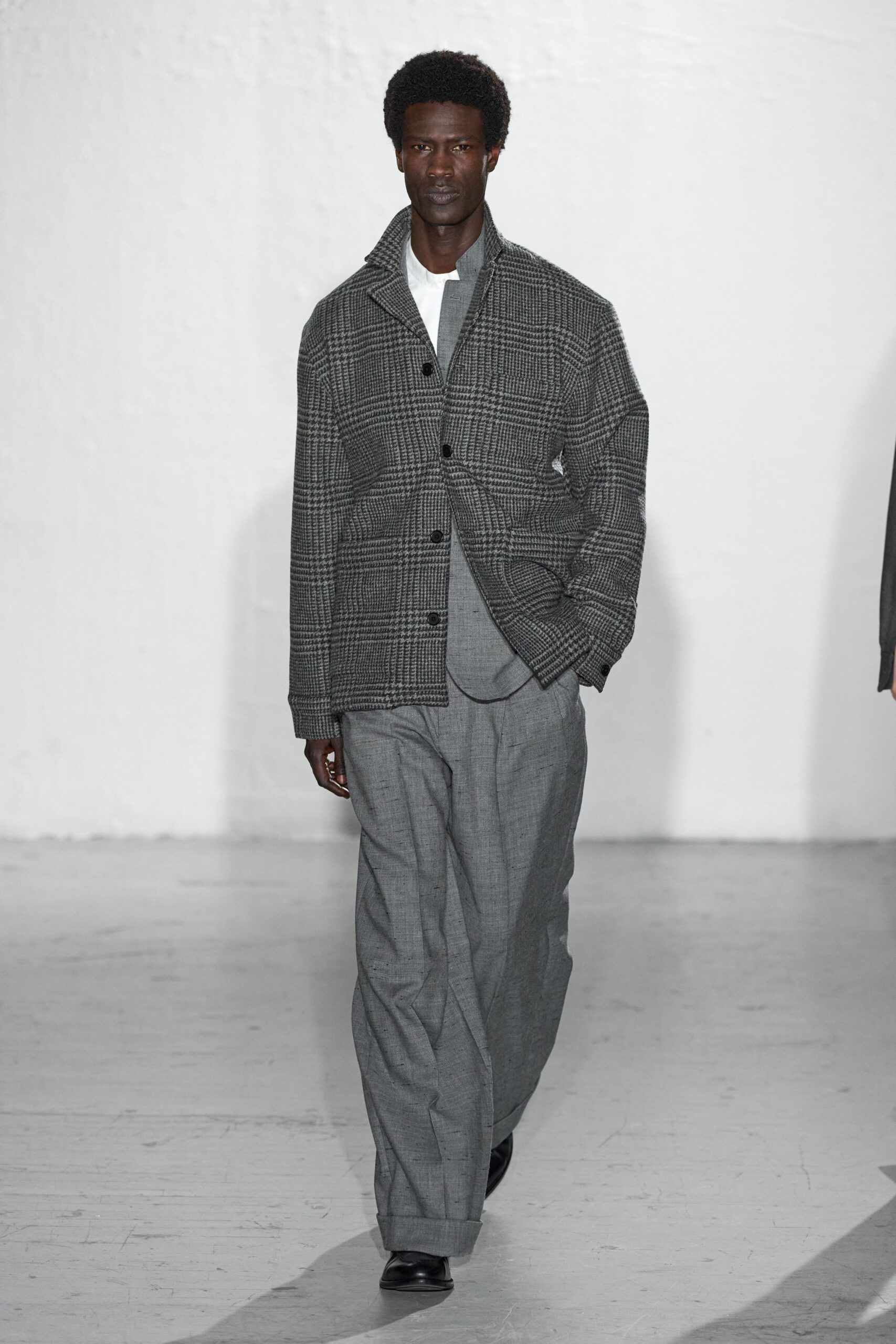 gray checked jacket with relaxed pants