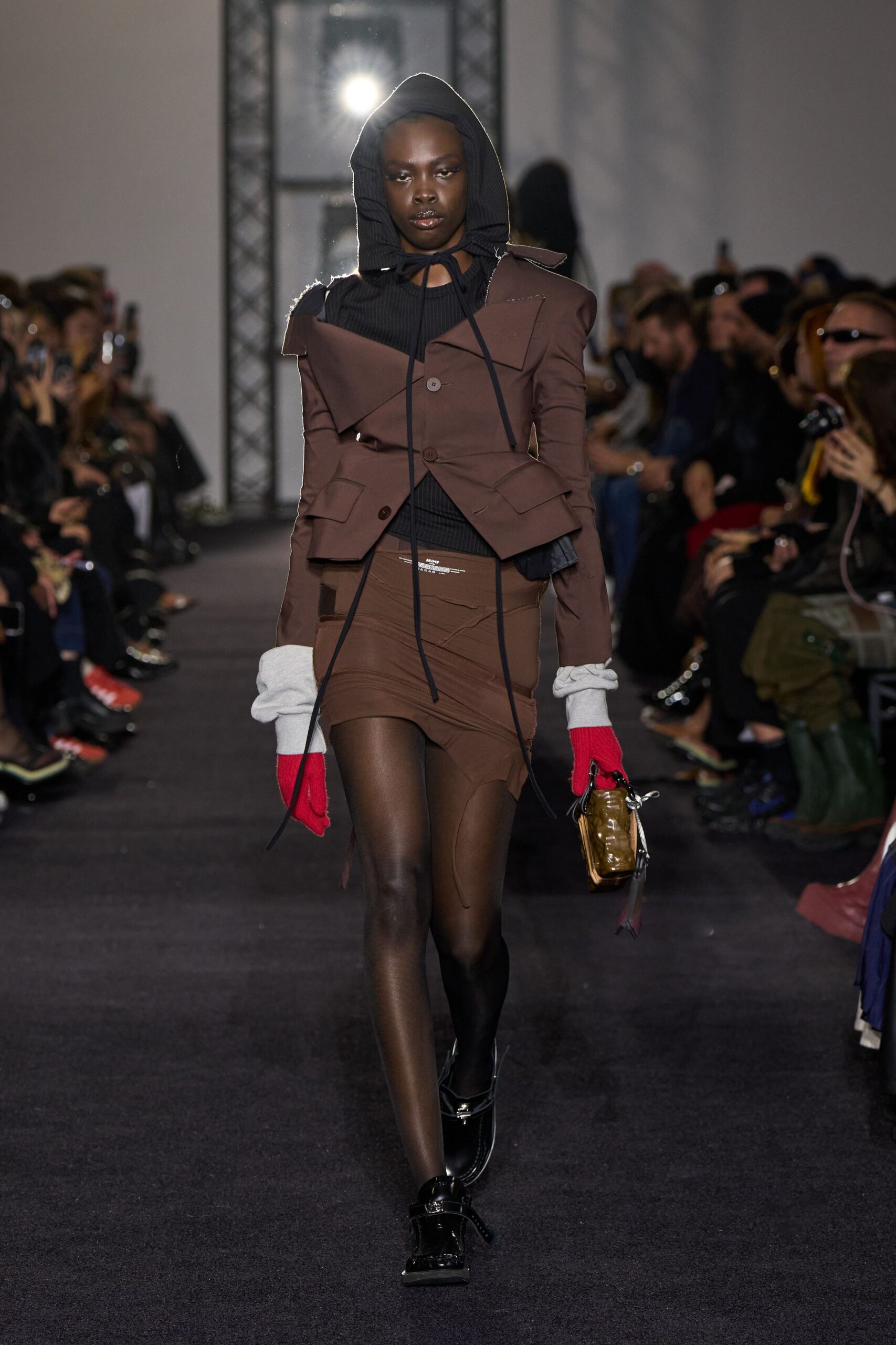 brown blazer black top fitted skirt
