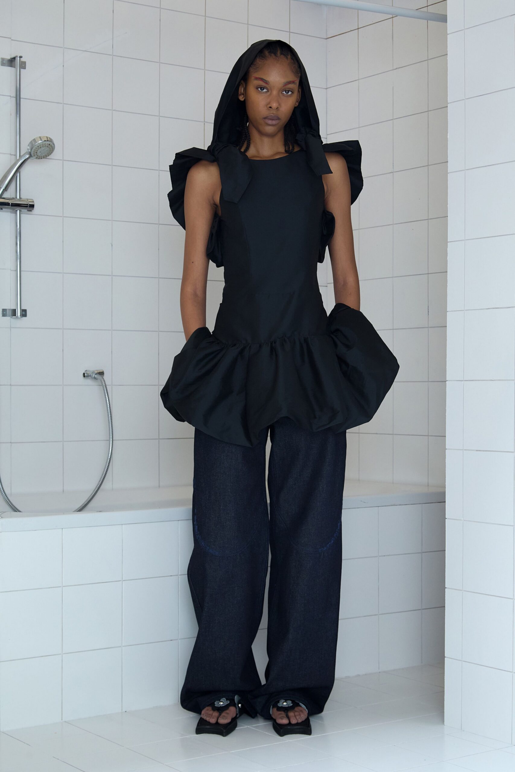 black cotton sleeveless high-neck fitted ruffled flared top