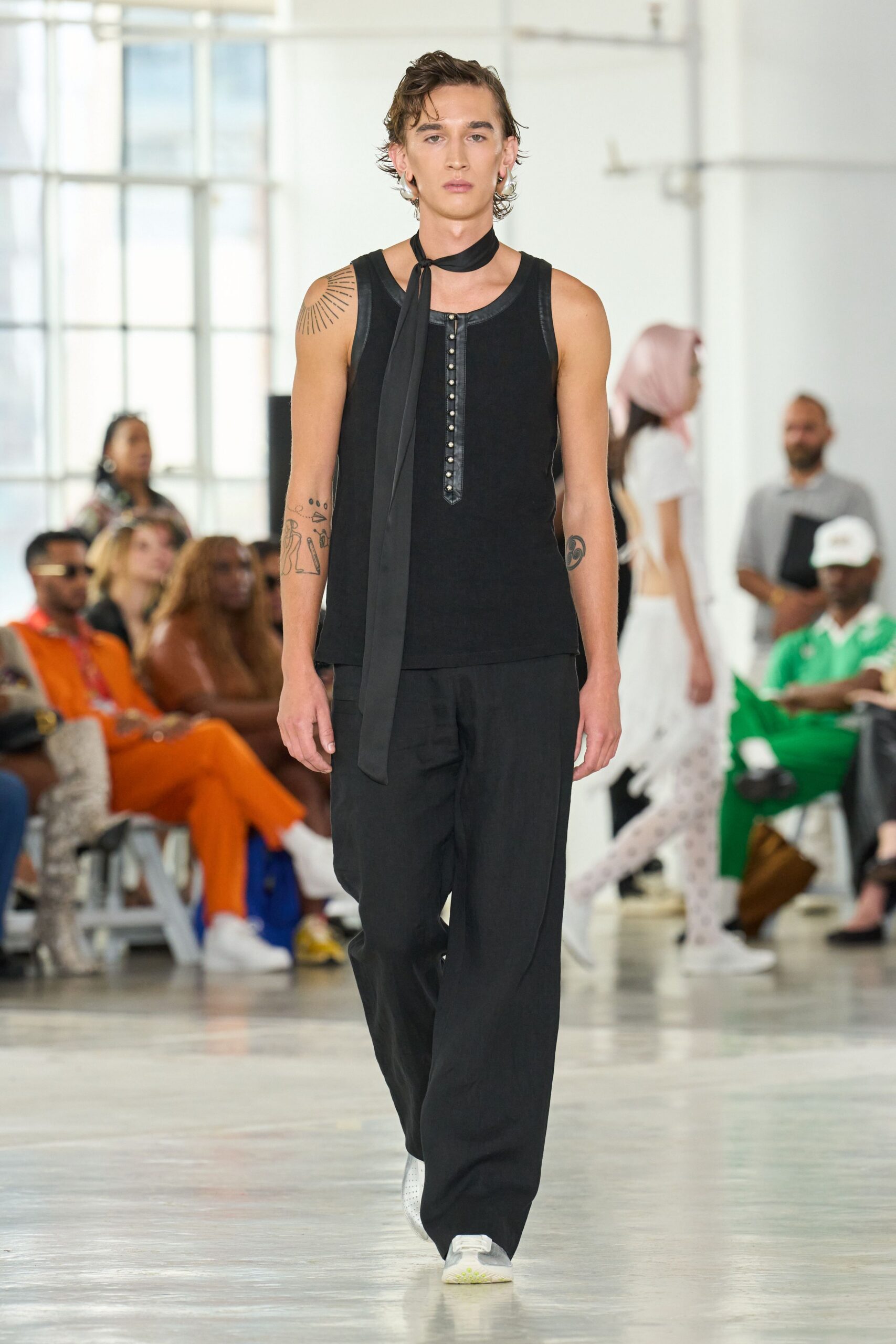 black tank-top and relaxed pants