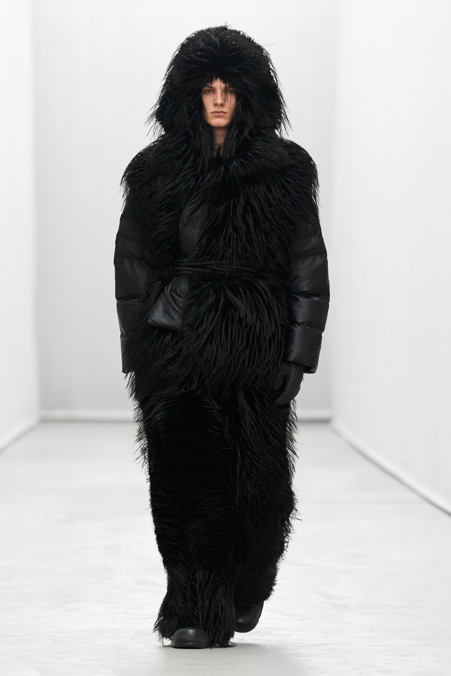 black faux-fur jumpsuit with gloves