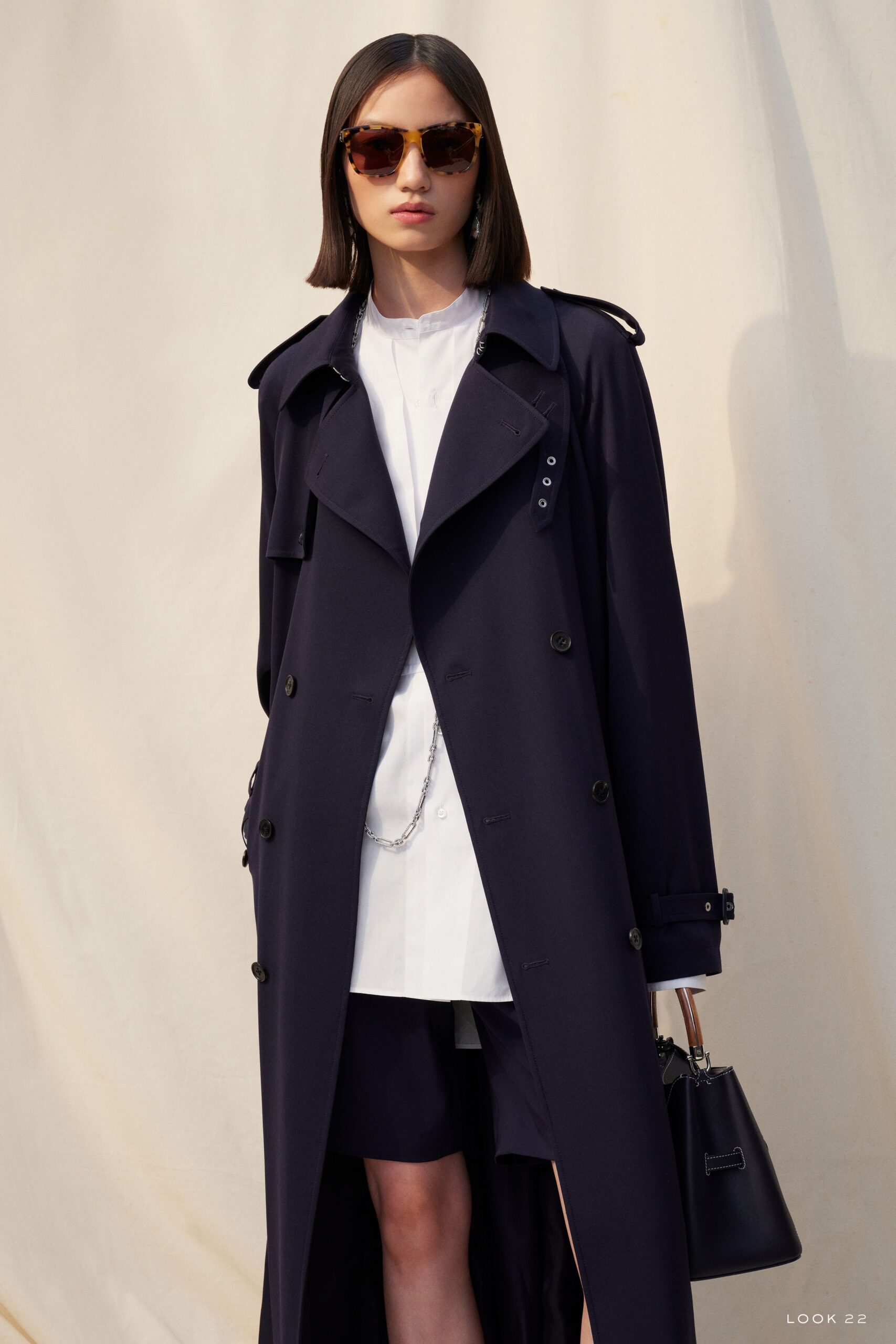 blue cotton long-sleeve collared relaxed buttoned maxi trench