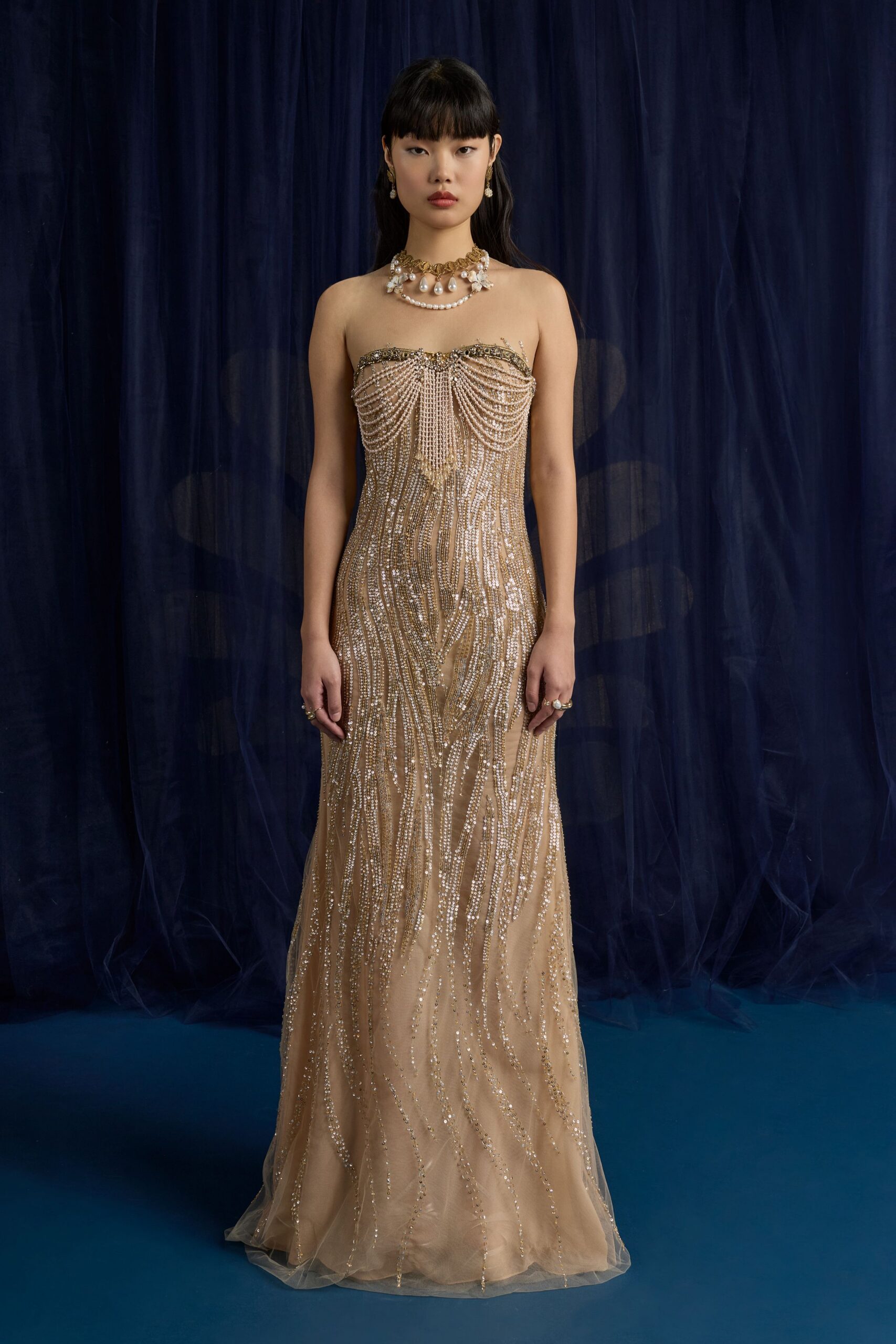 beige strapless embellished gown