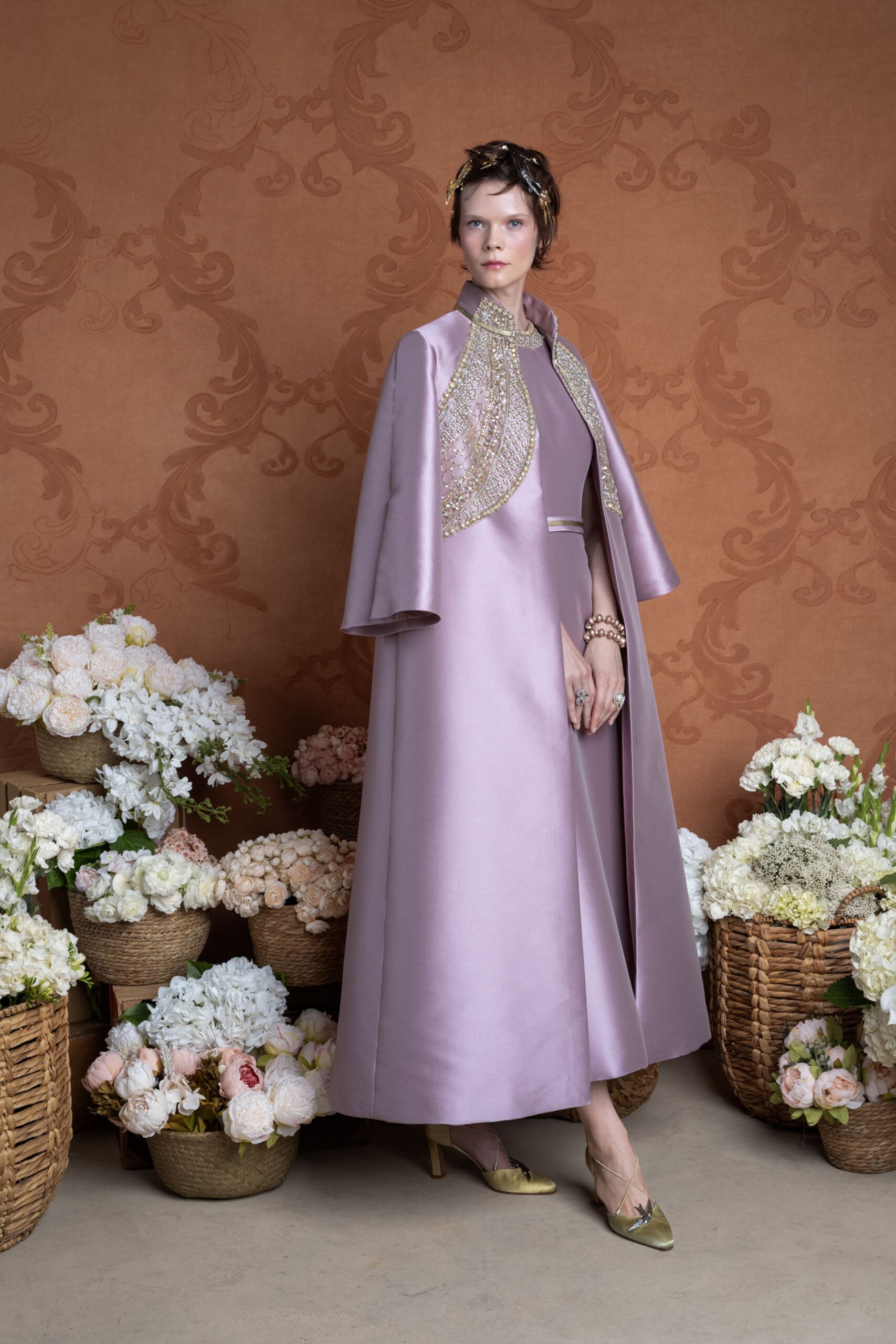 lavender cape and purple dress