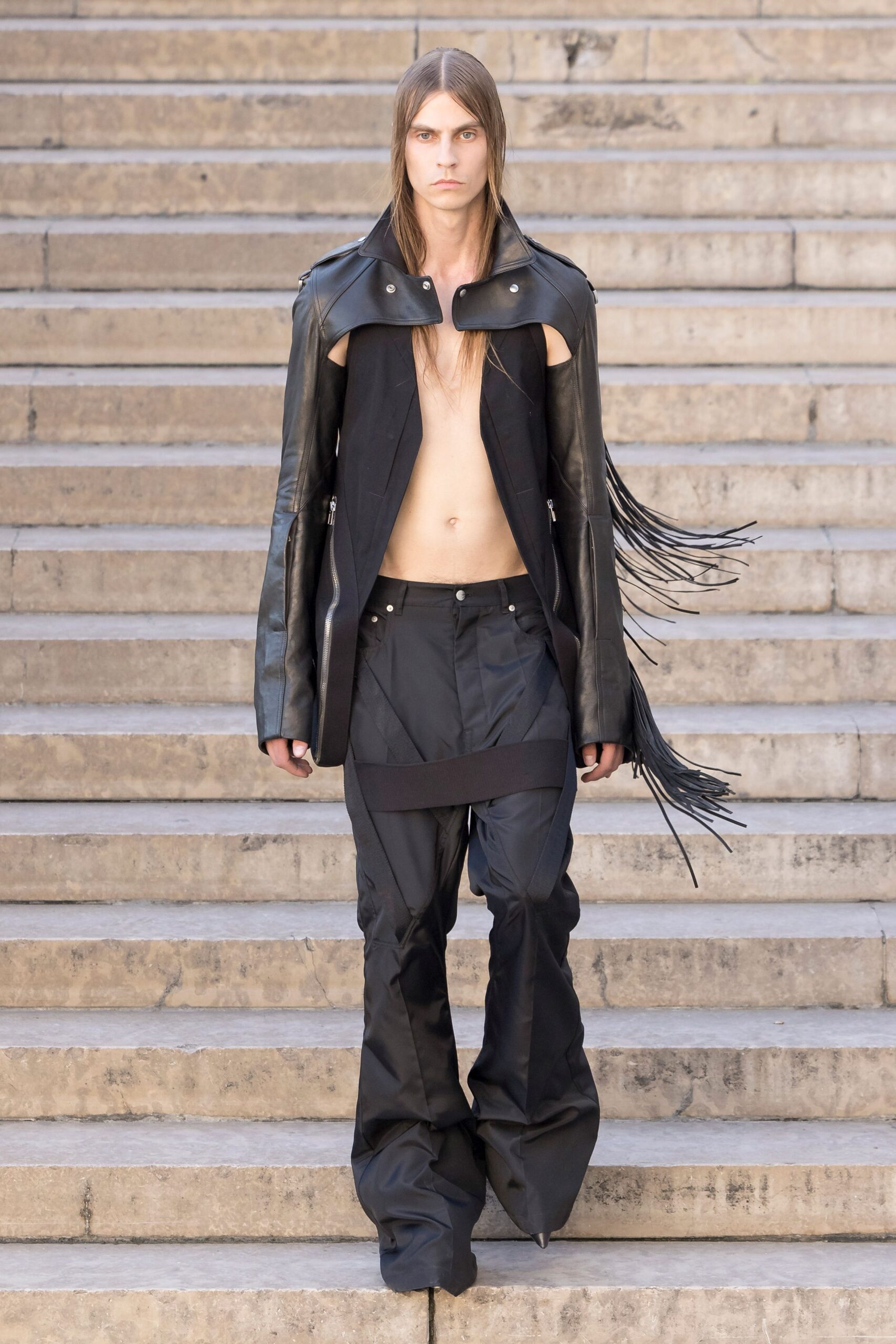black leather jacket and relaxed pants