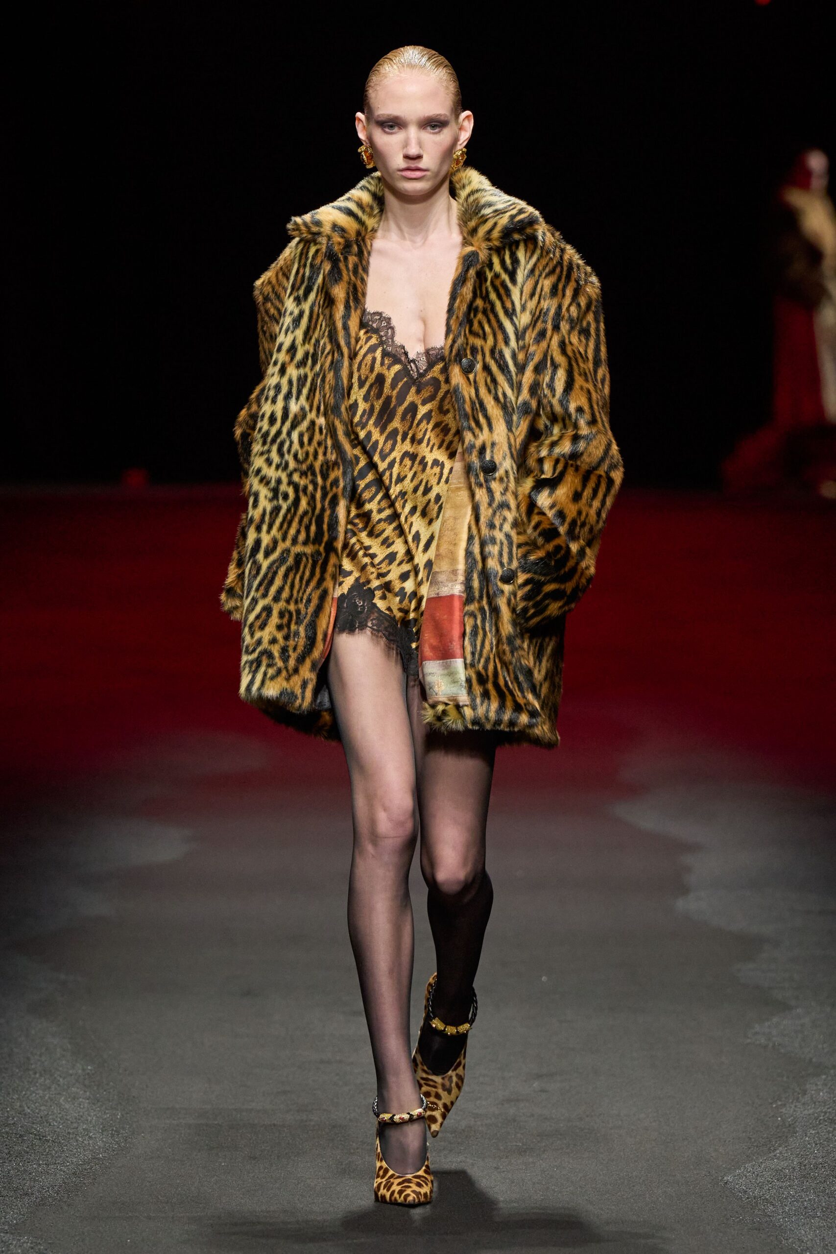 animal-print fur coat with lace dress
