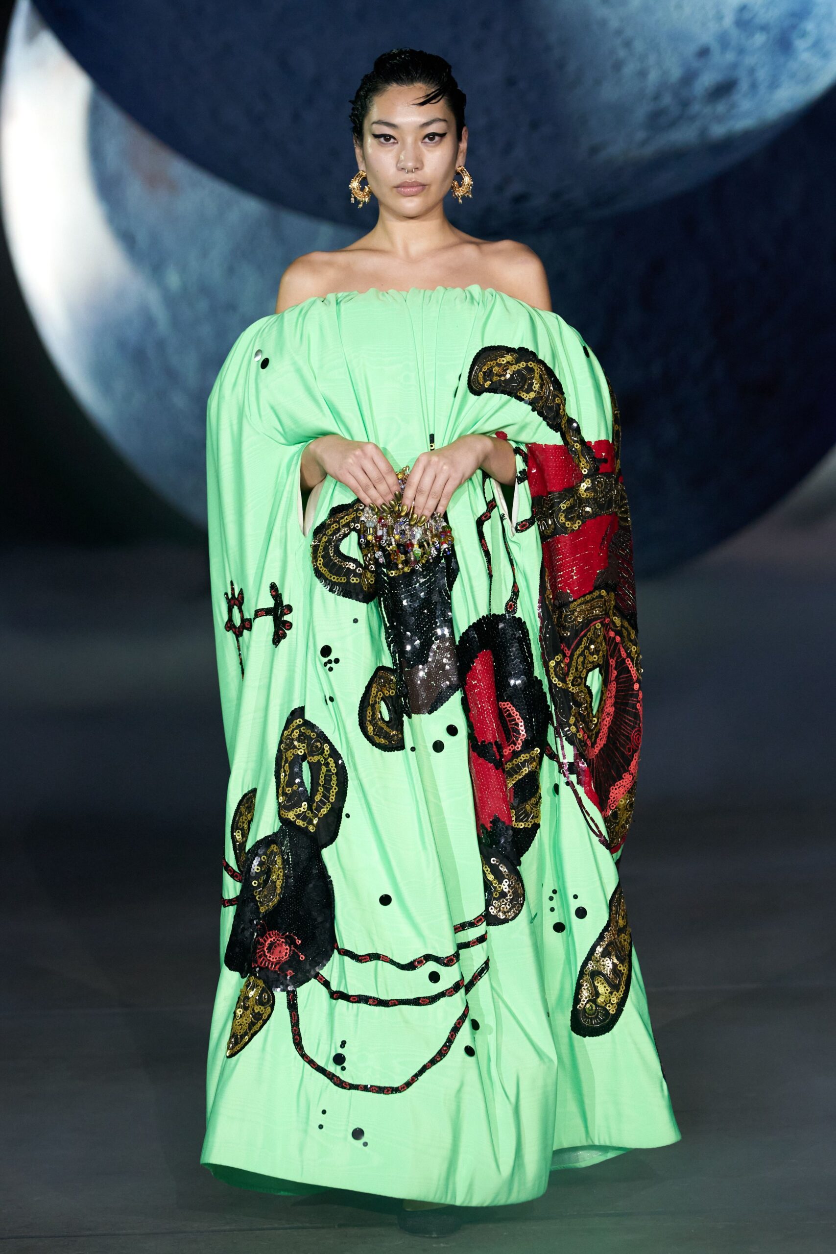 green embroidered off-shoulder gown