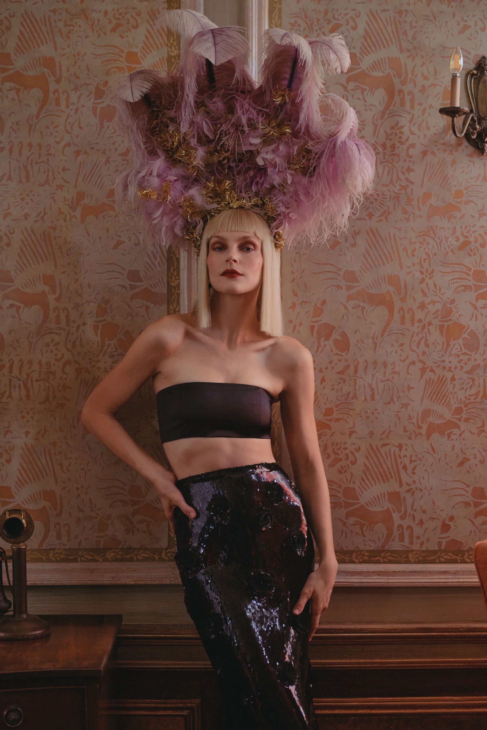 purple feather structured embellished hat
