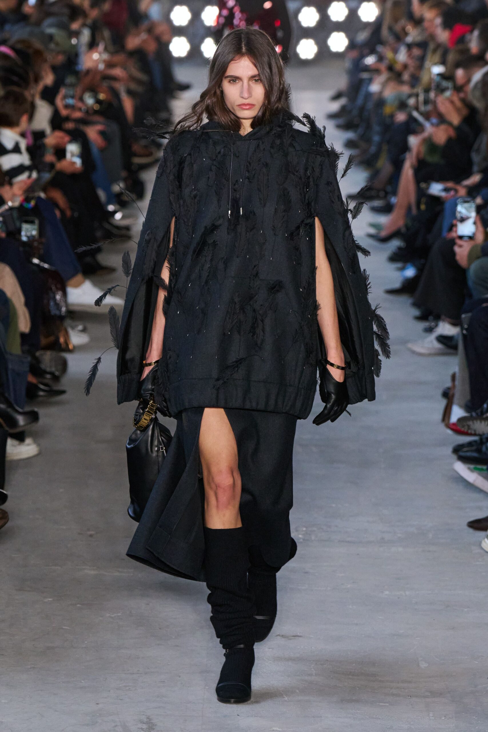 black cape and skirt ensemble