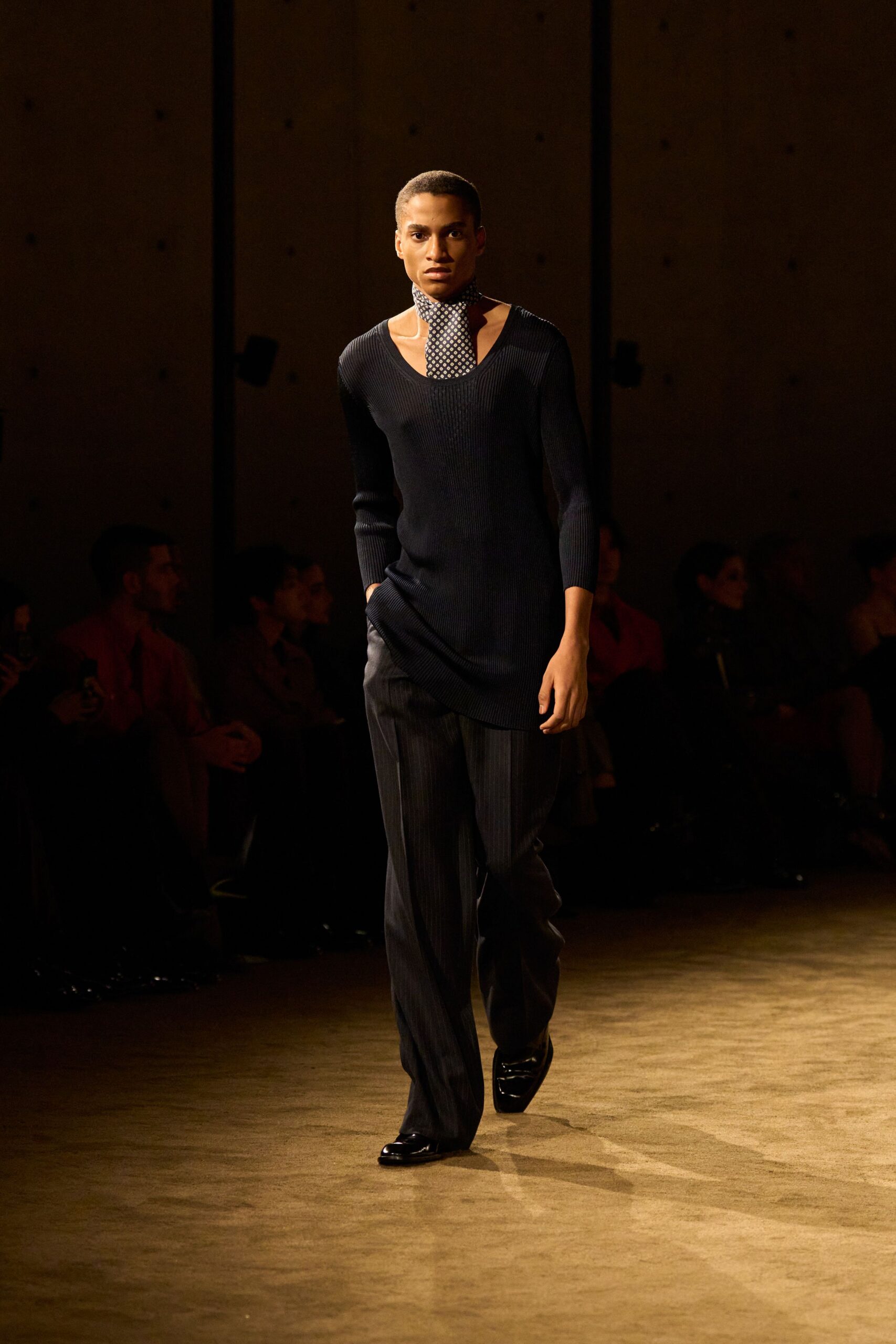 black fitted top and tailored pants