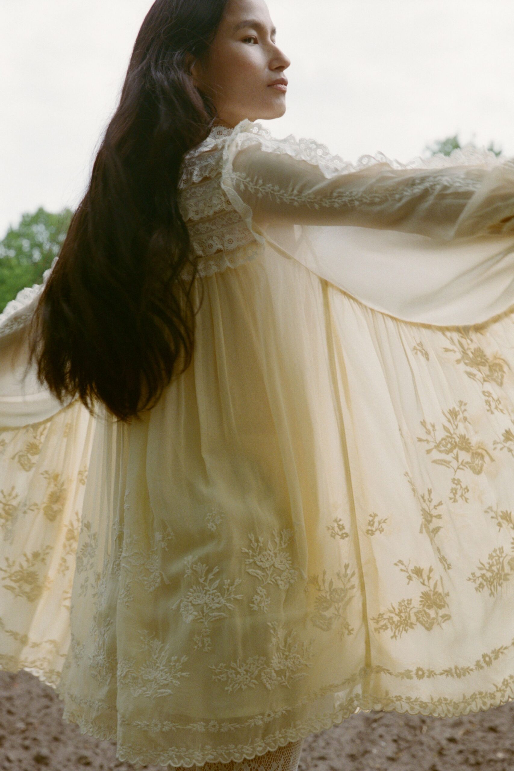 yellow embroidered sleeveless dress