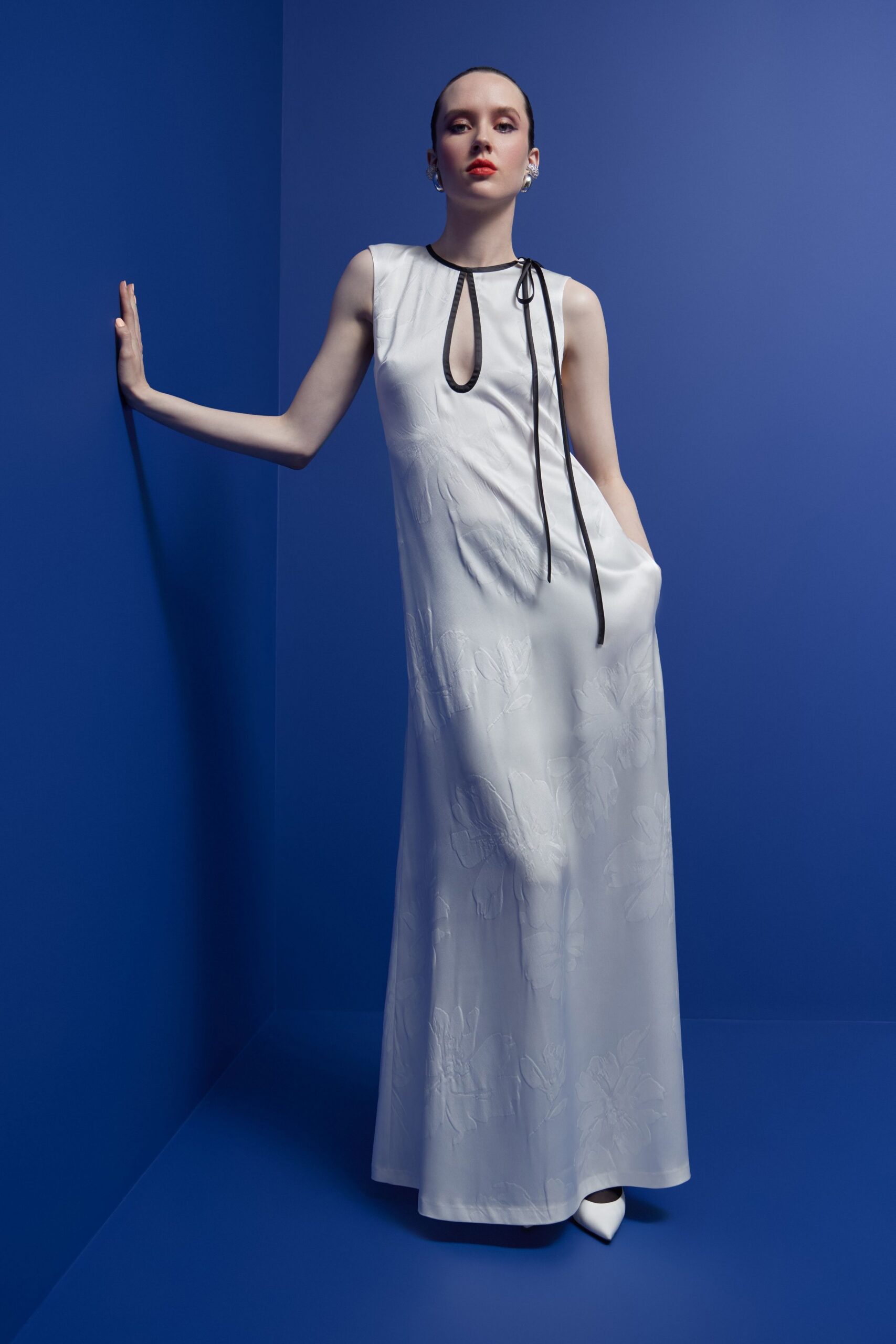 white silk embroidered gown