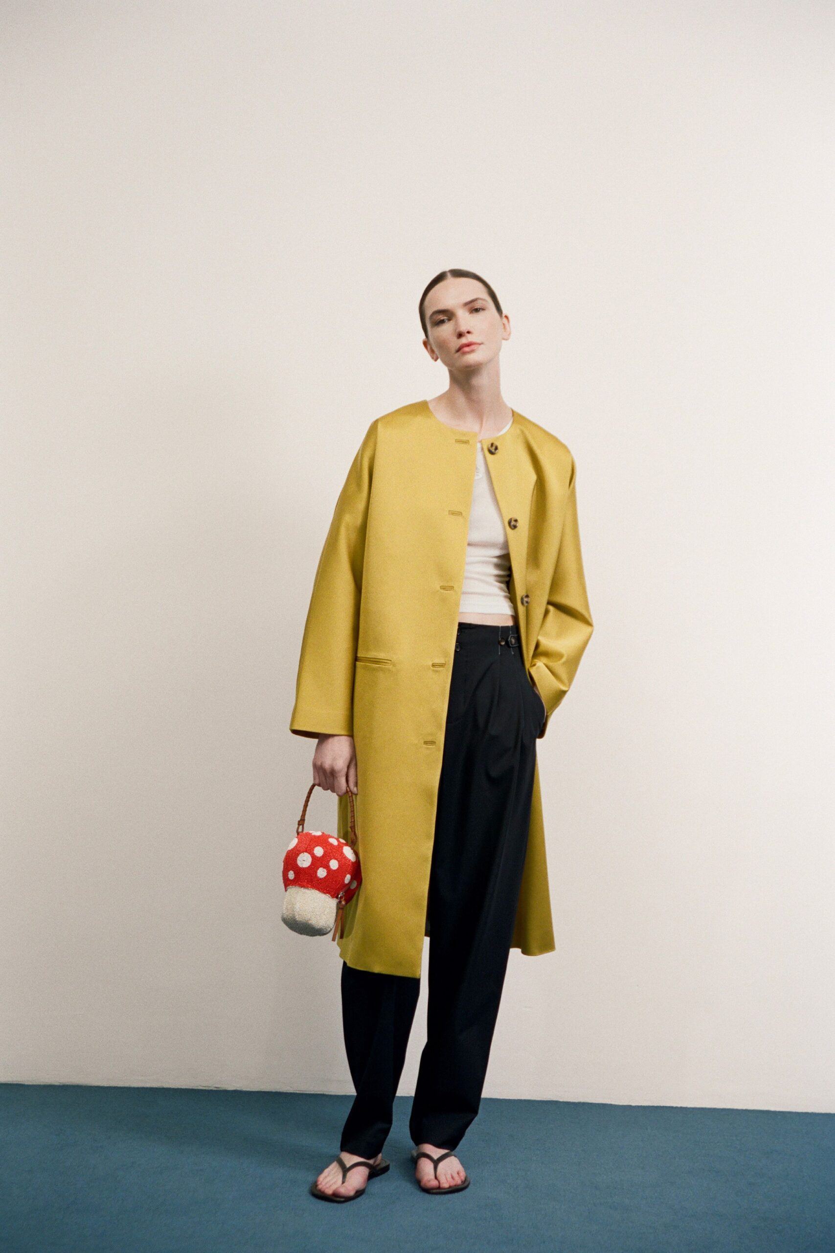 yellow cotton long-sleeve collared relaxed buttoned coat