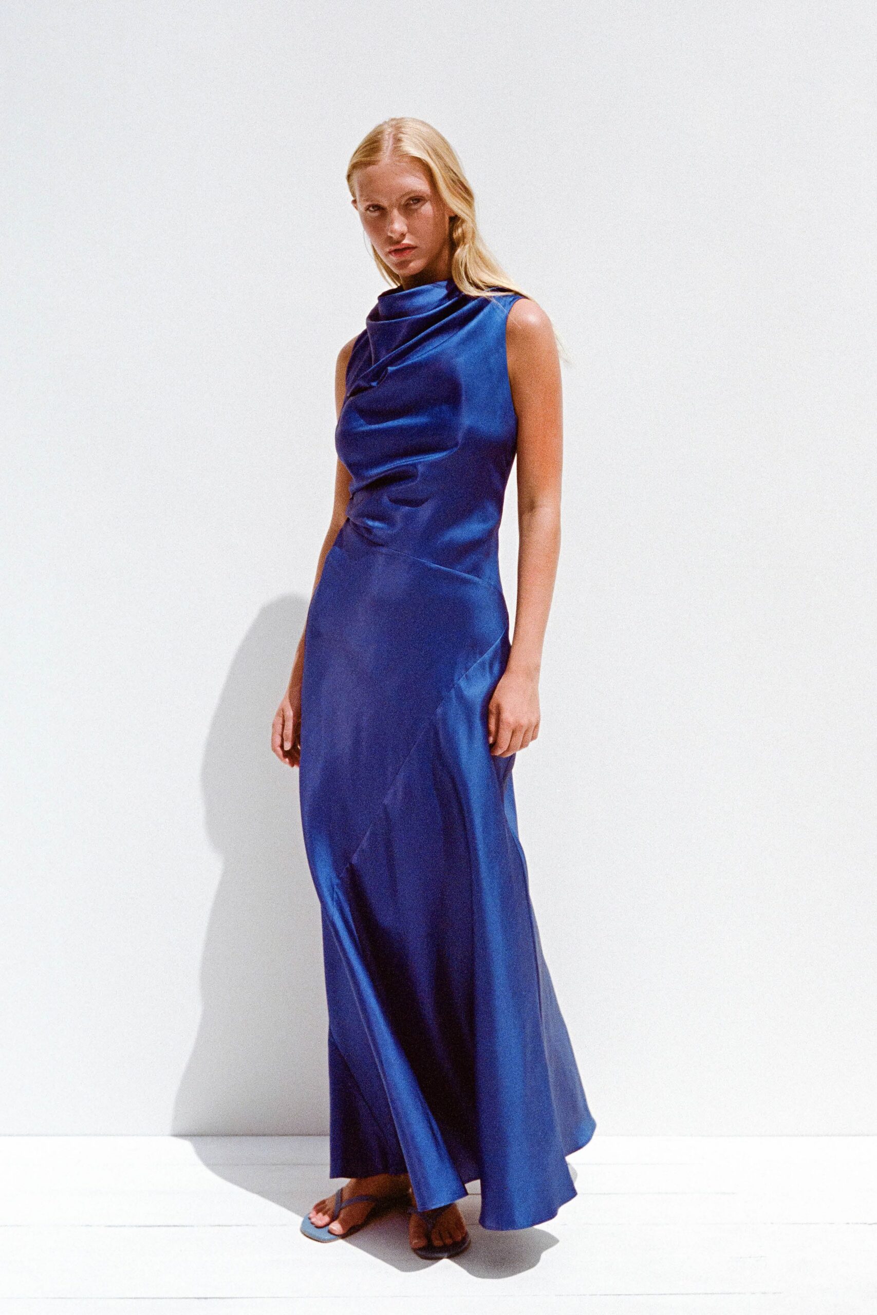 blue silk sleeveless high-neck fitted draped shiny gown