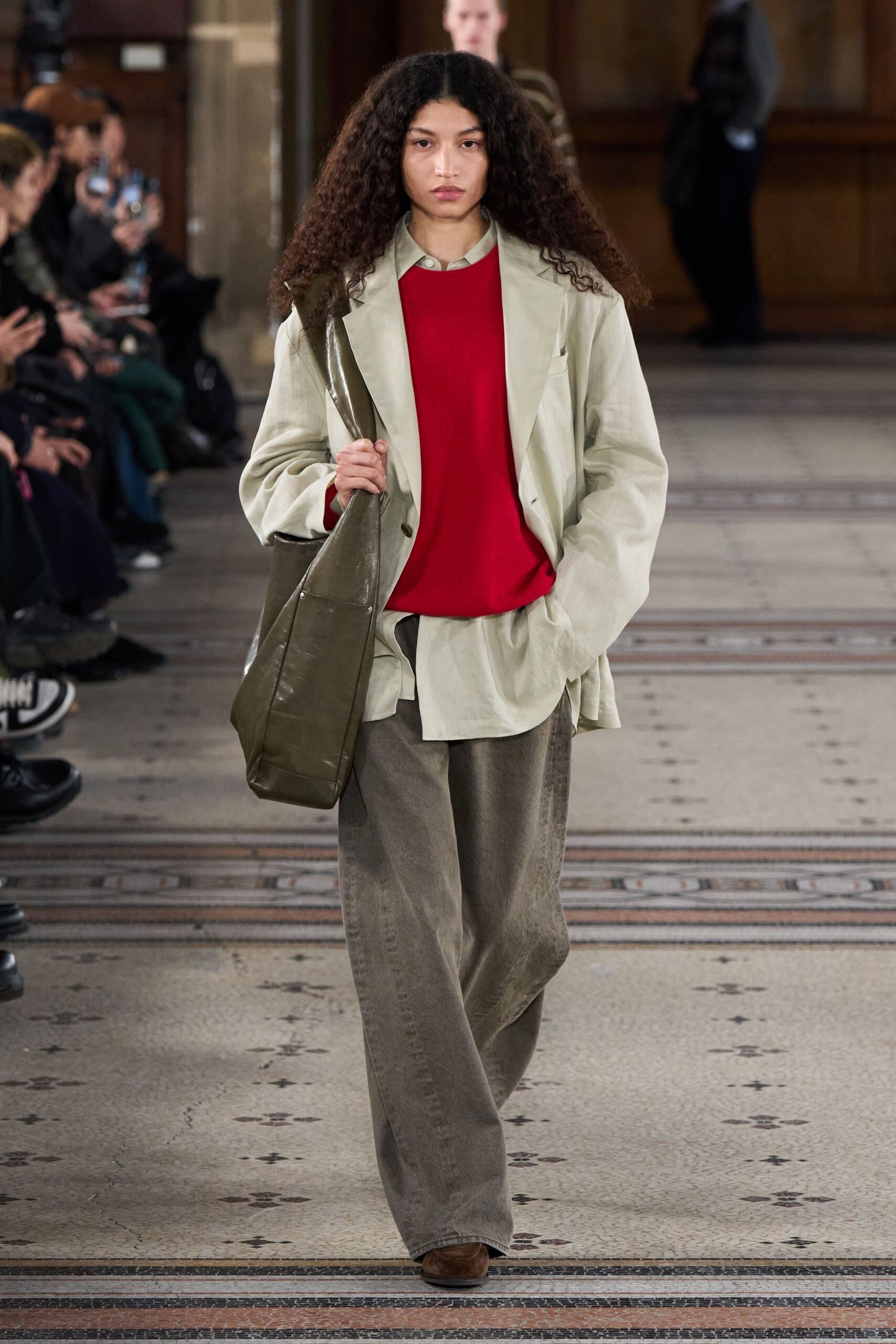 beige blazer red top gray pants