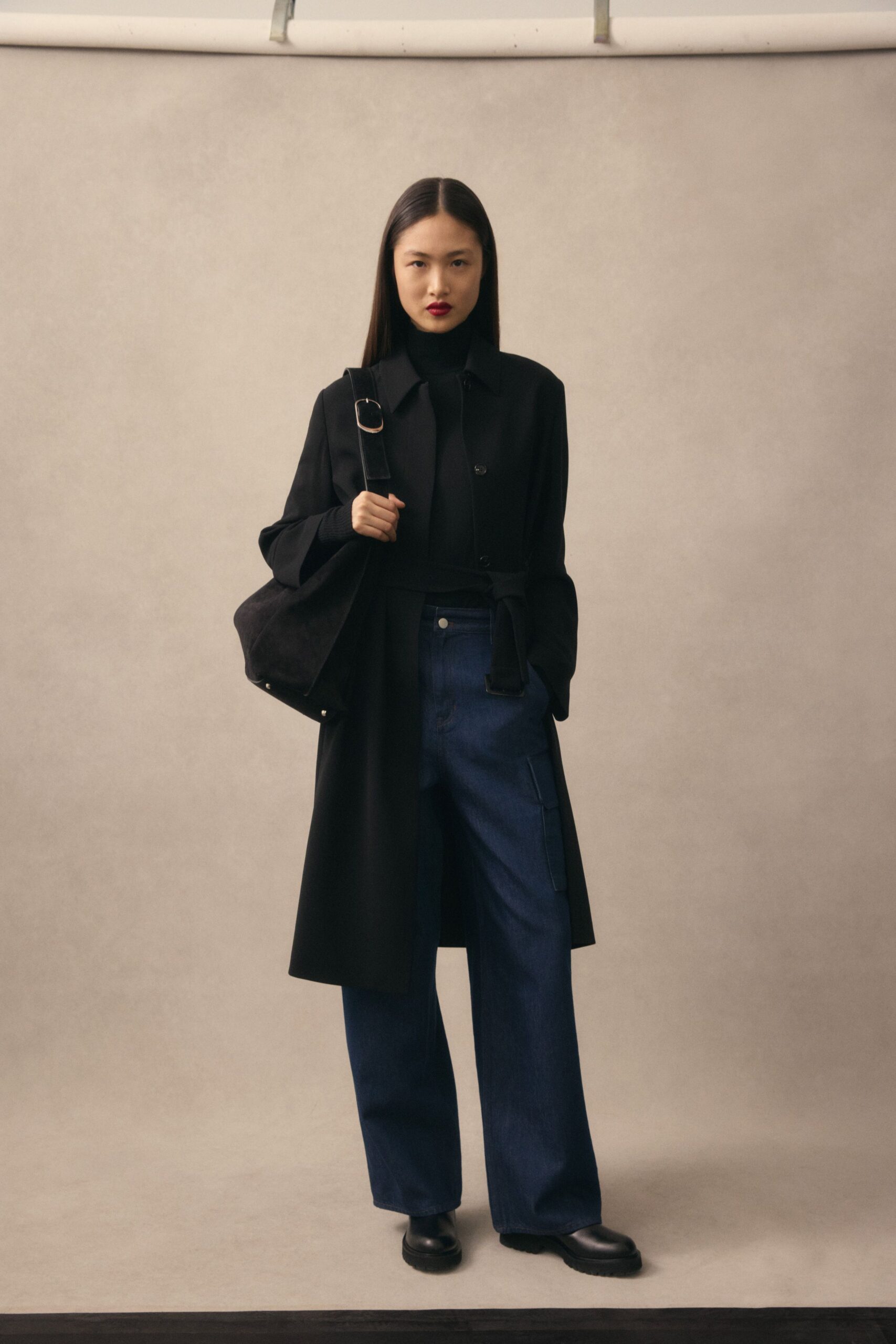 black coat with denim pants