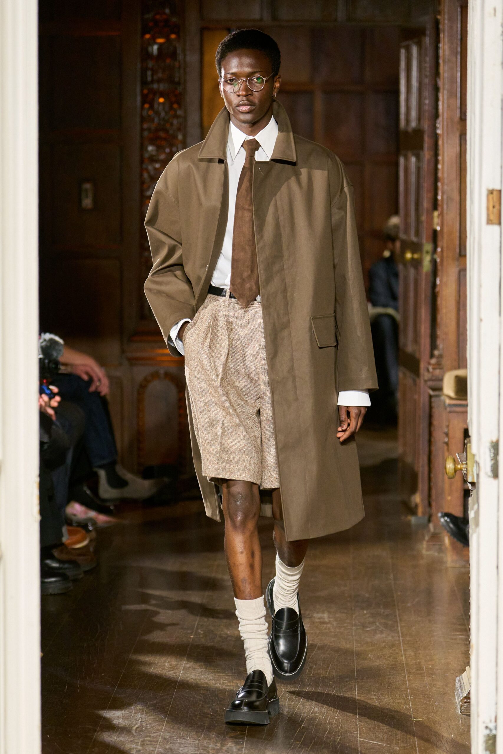 brown coat with beige shorts