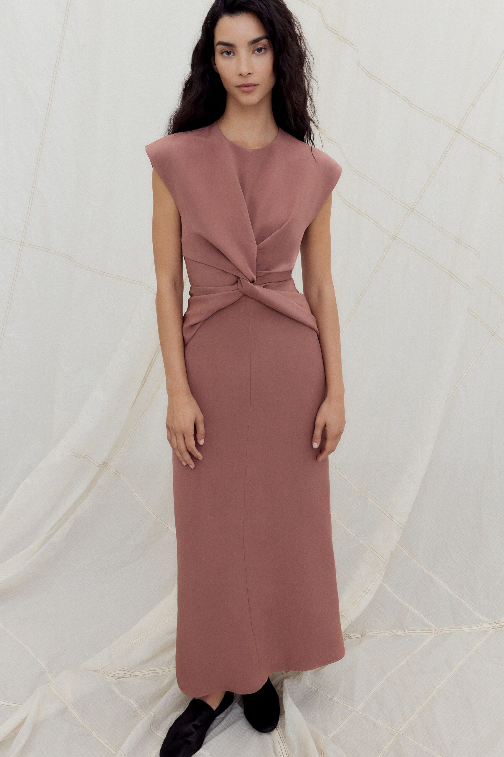 fitted pink maxi dress with draped detail