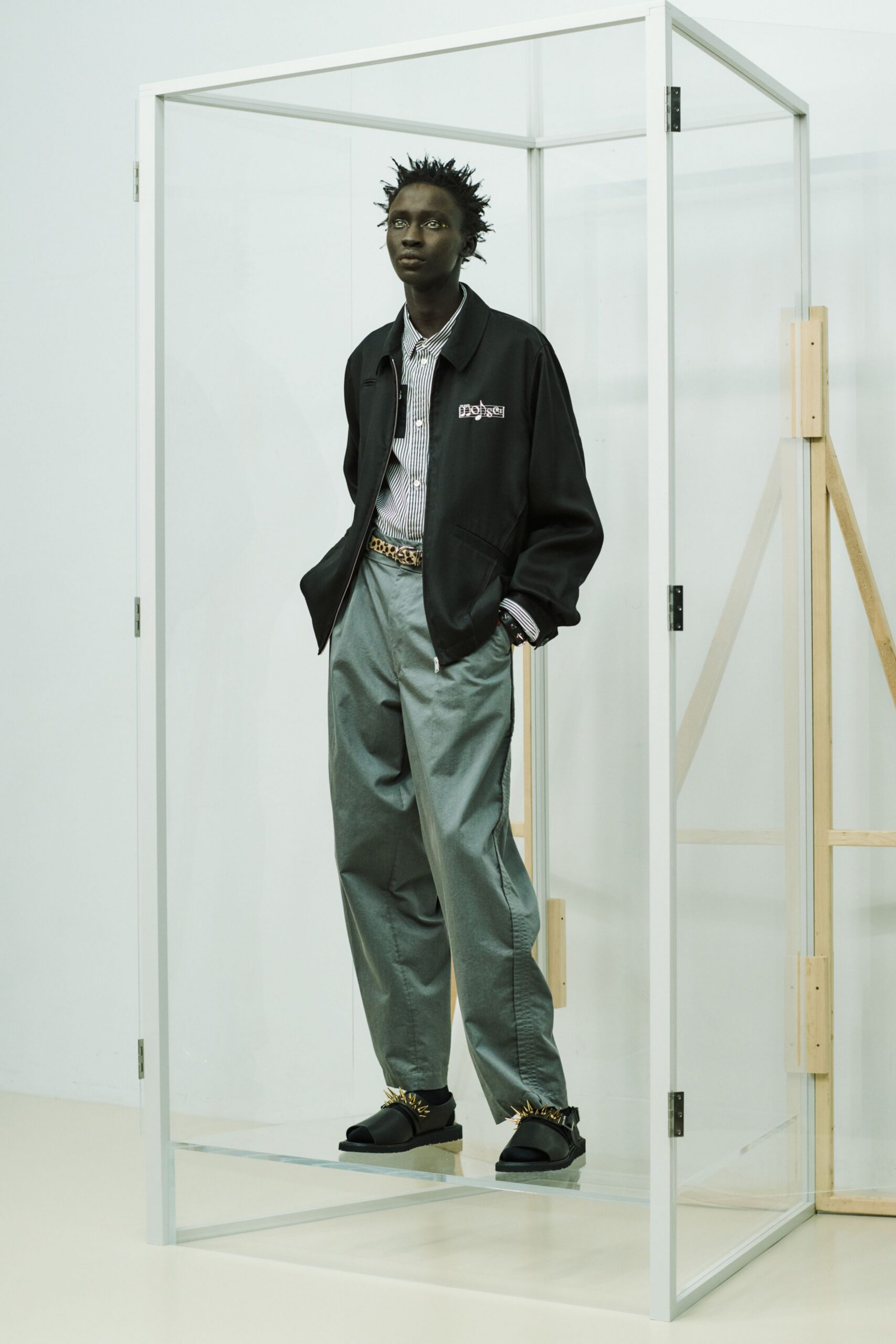 black relaxed jacket with gray pants