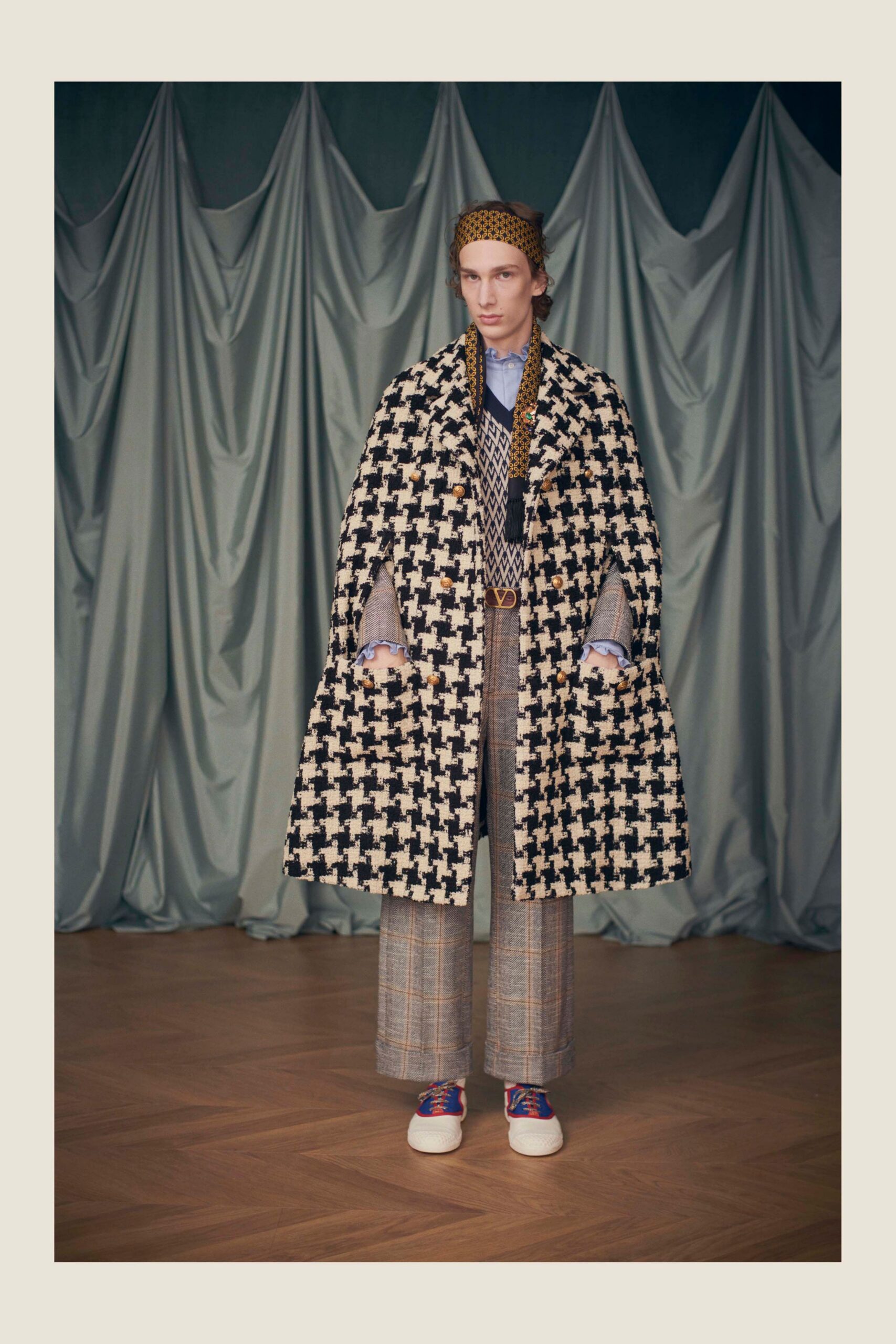 checked wool cape with shirt and wide-leg pants