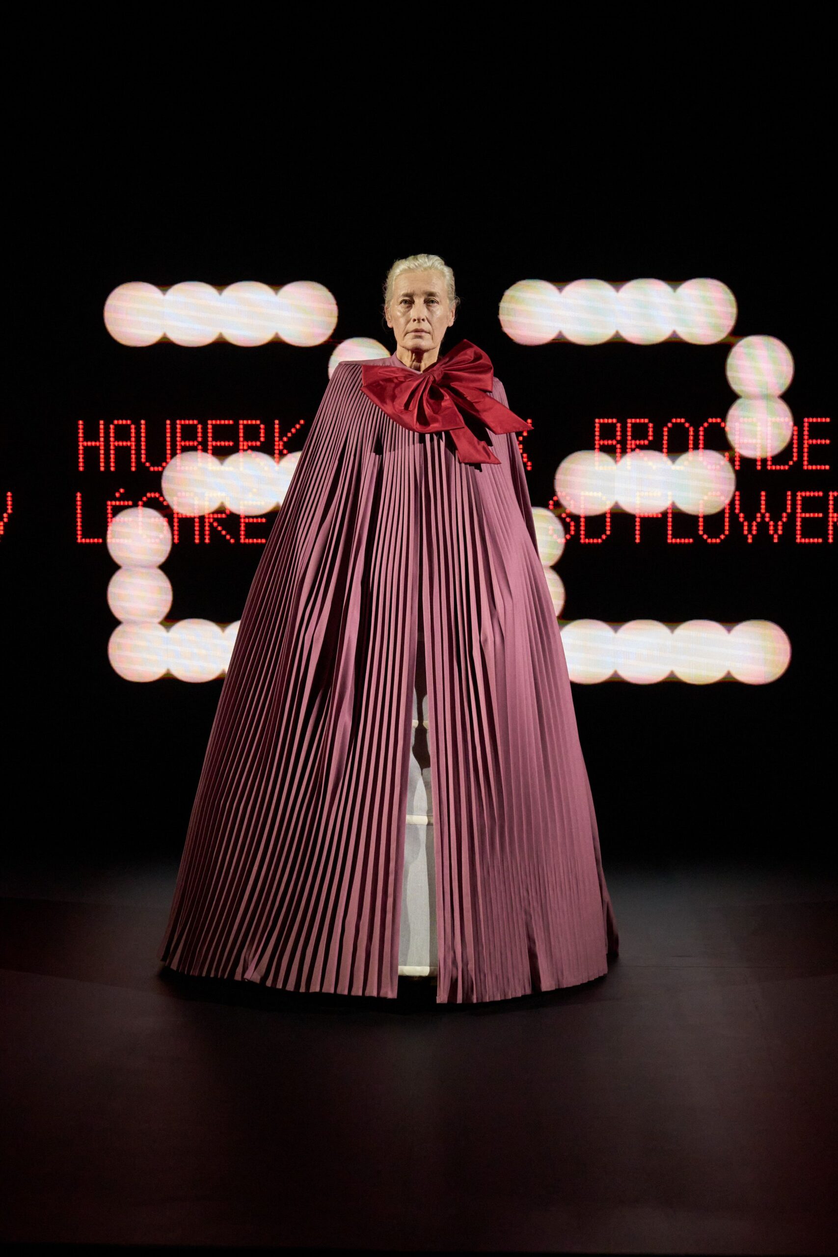 purple pleated silk cape