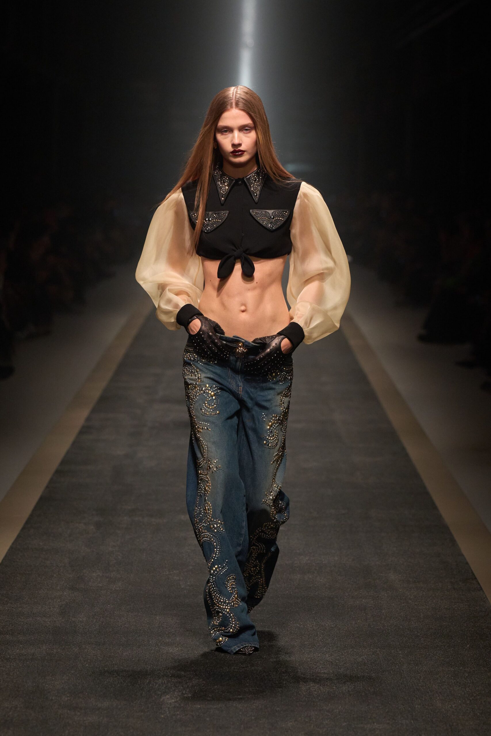 black fitted top with embroidered pants