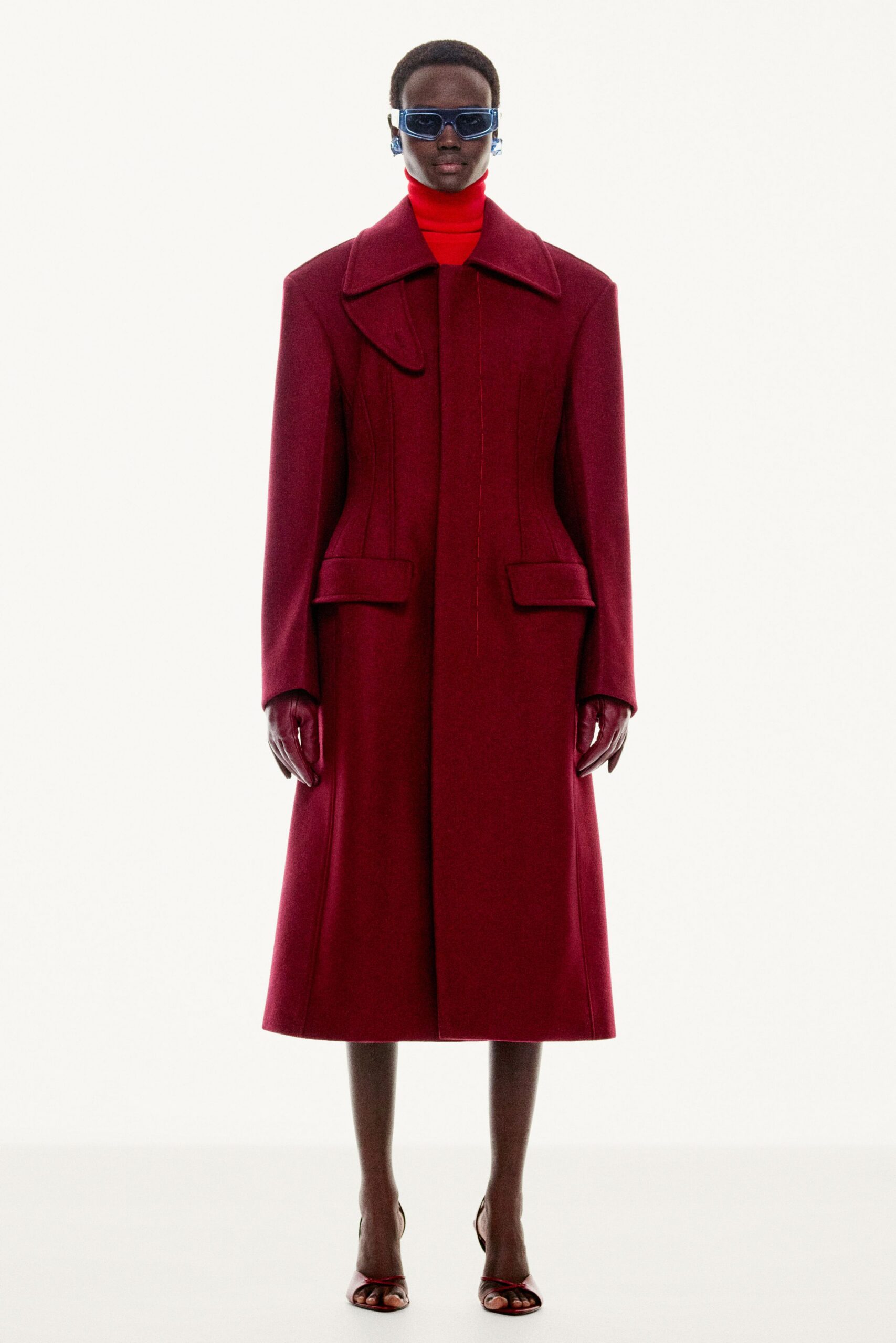 red wool long-sleeve collared oversized buttoned midi coat