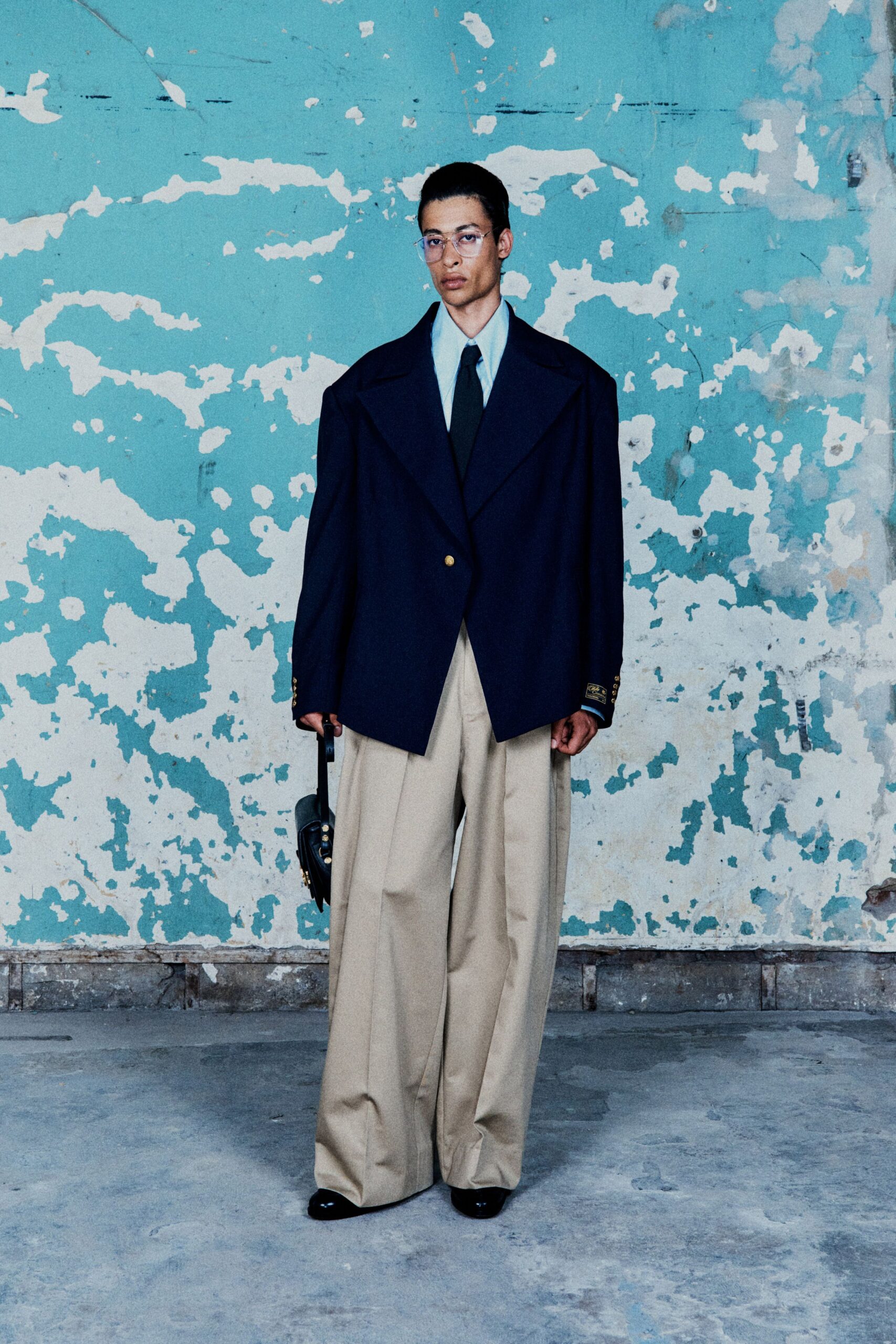 oversized navy jacket with beige pants