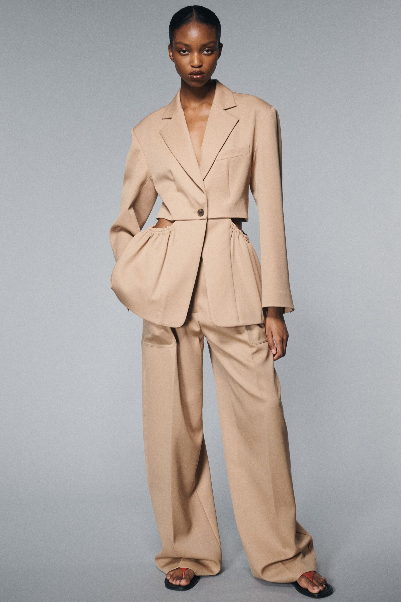 beige wool long-sleeve collared tailored buttoned pleated blazer