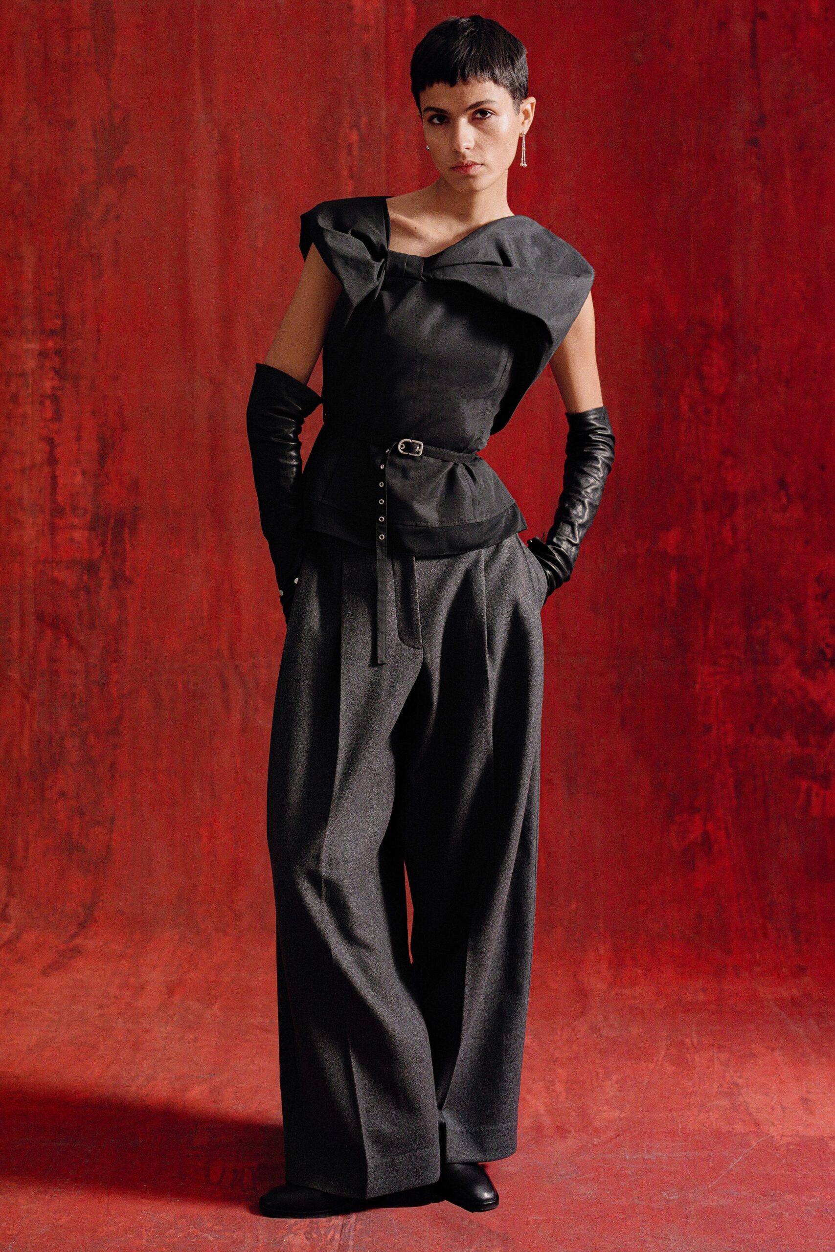 black leather sleeveless high-neck fitted draped belted top