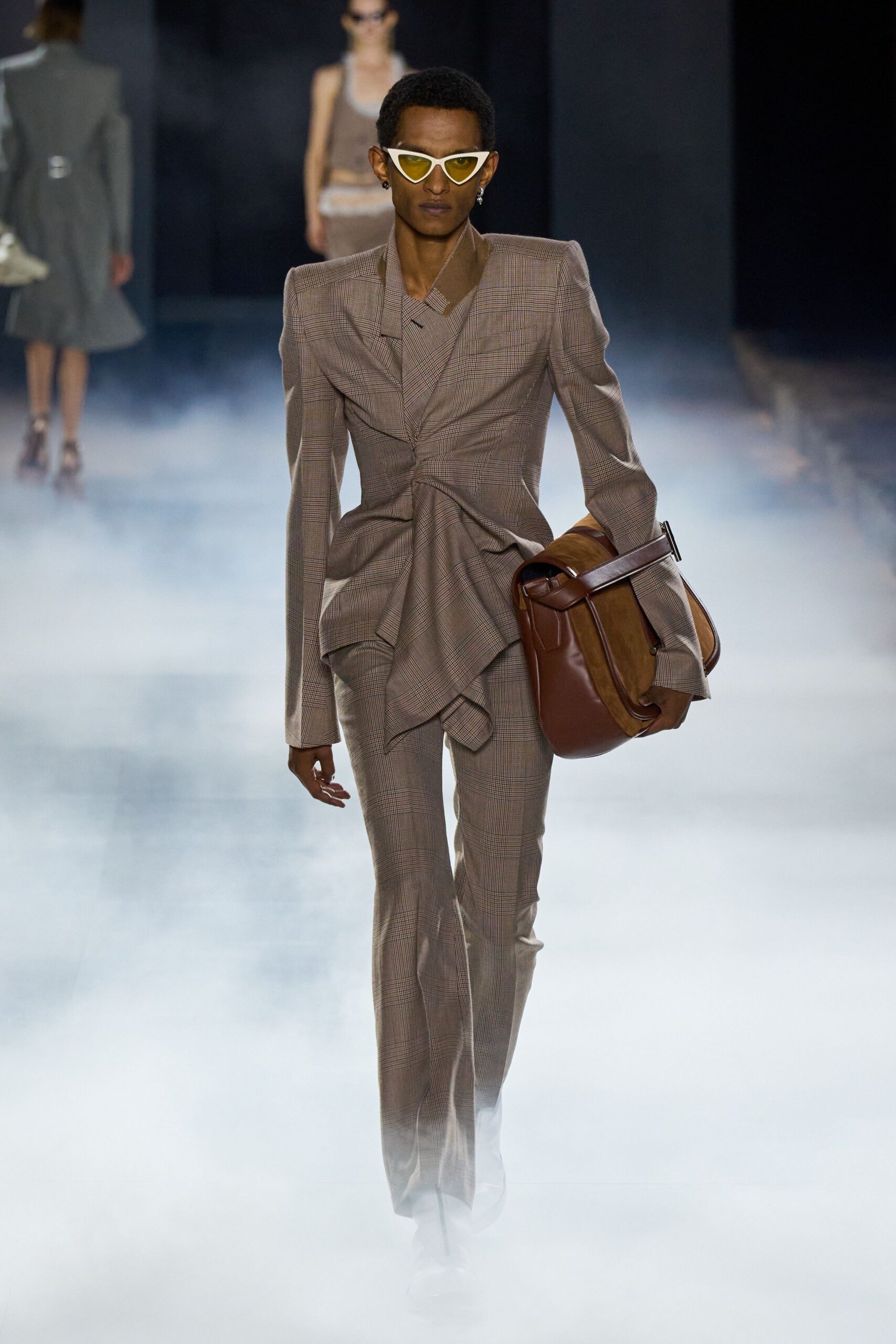 beige tailored suit with bag