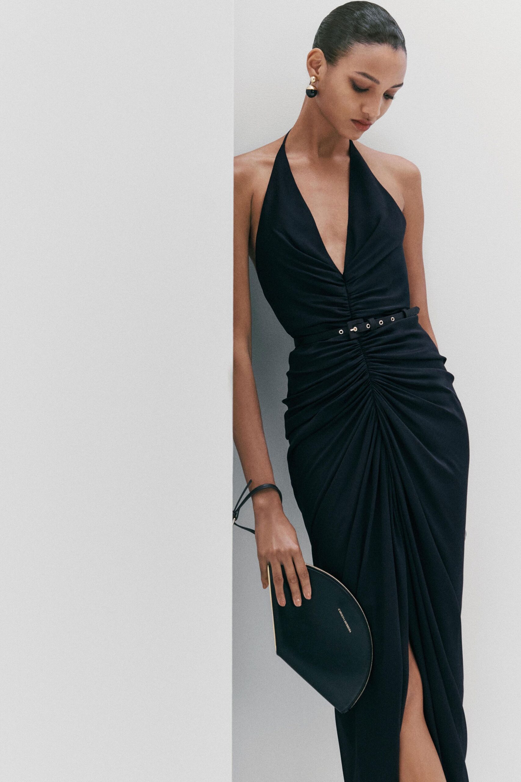 black silk sleeveless v-neck fitted ruched belted gown